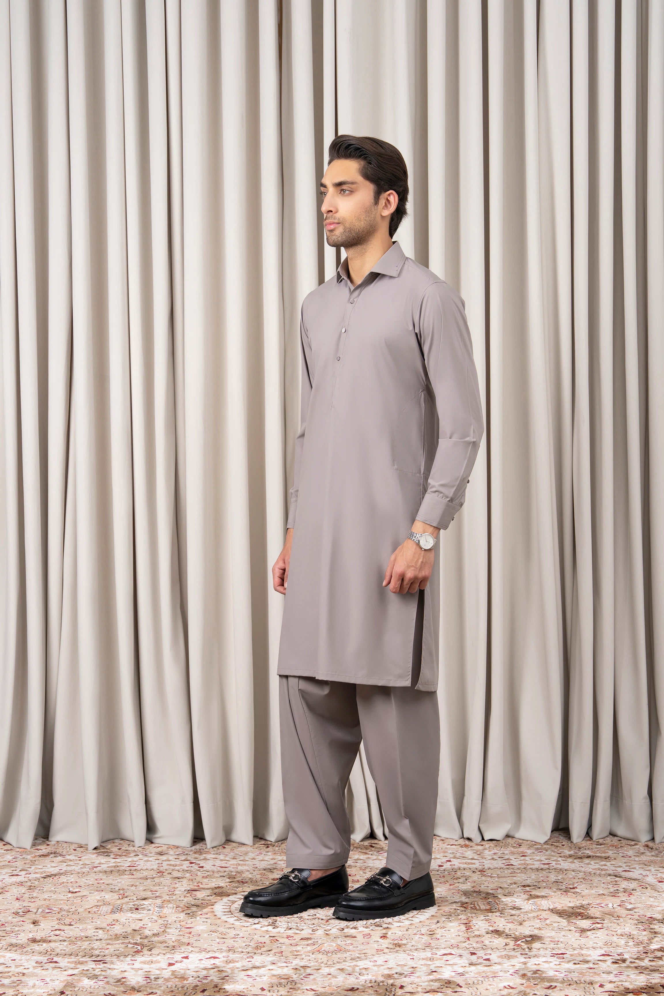 Light grey kameez and shalwar set, side profile with button placket and relaxed fit