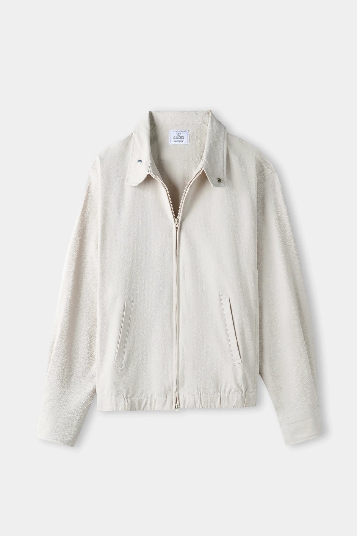 Beige seersucker raglan full-sleeve jacket with front zip and spread collar