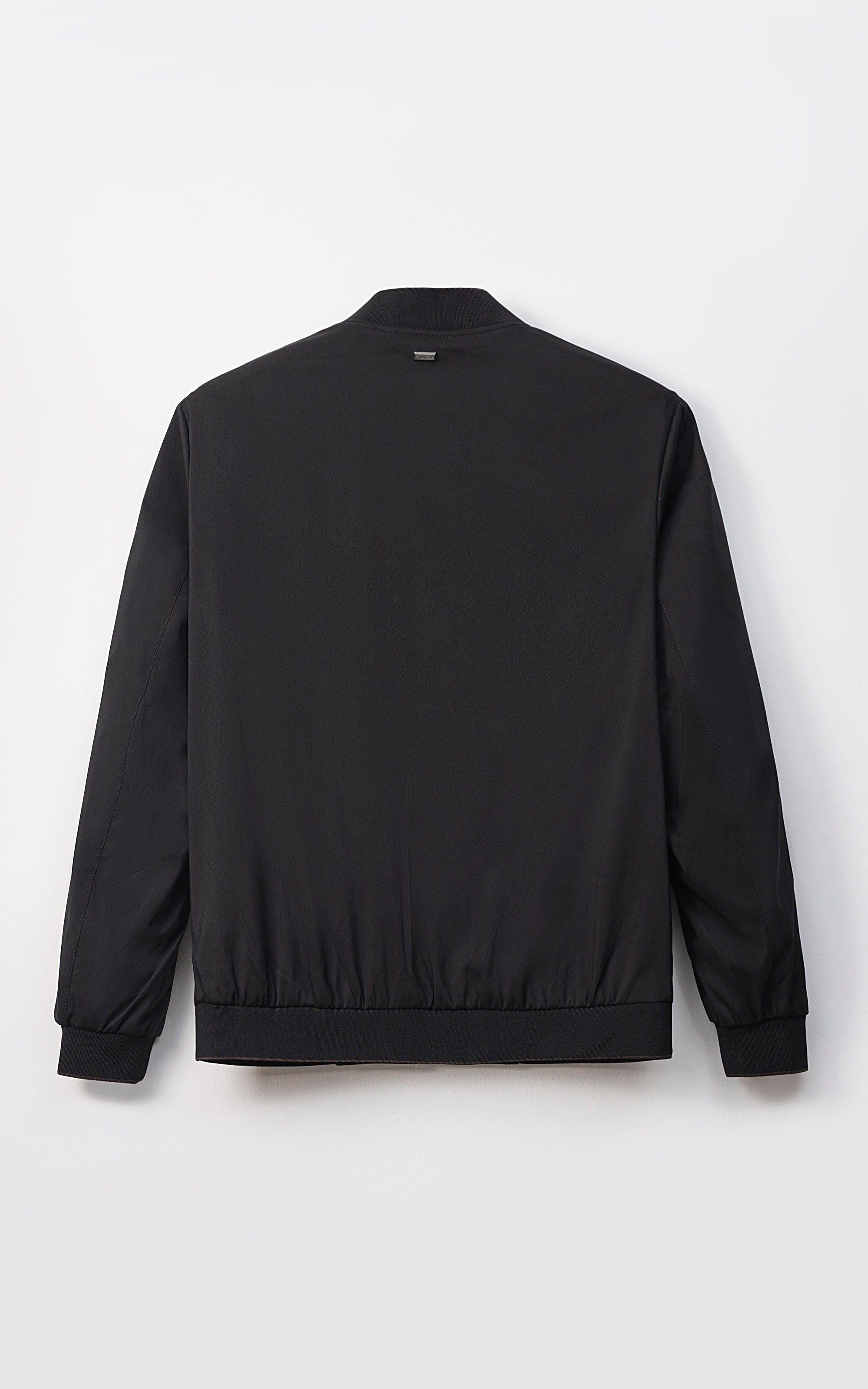 Lightweight men's black jacket with full sleeves, ribbed hem and cuffs, back view
