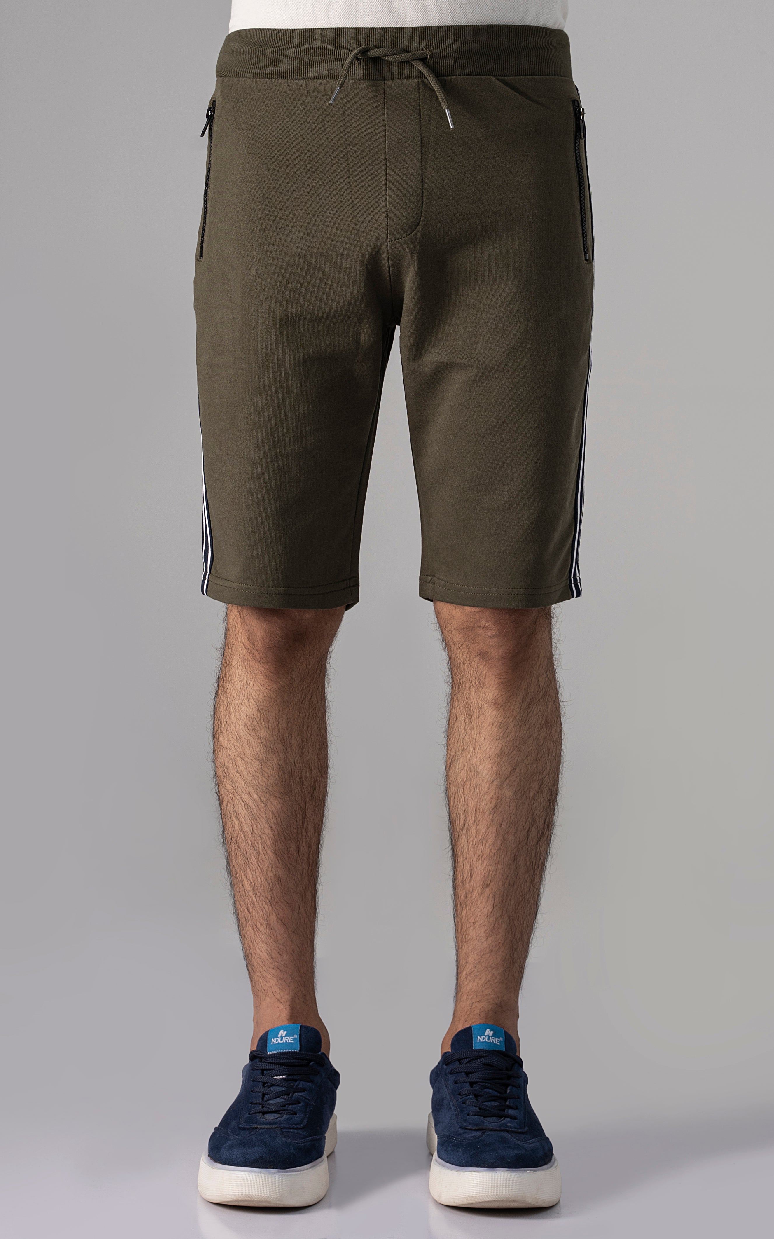Olive casual shorts with drawstring, slant pockets, elastic waistband.