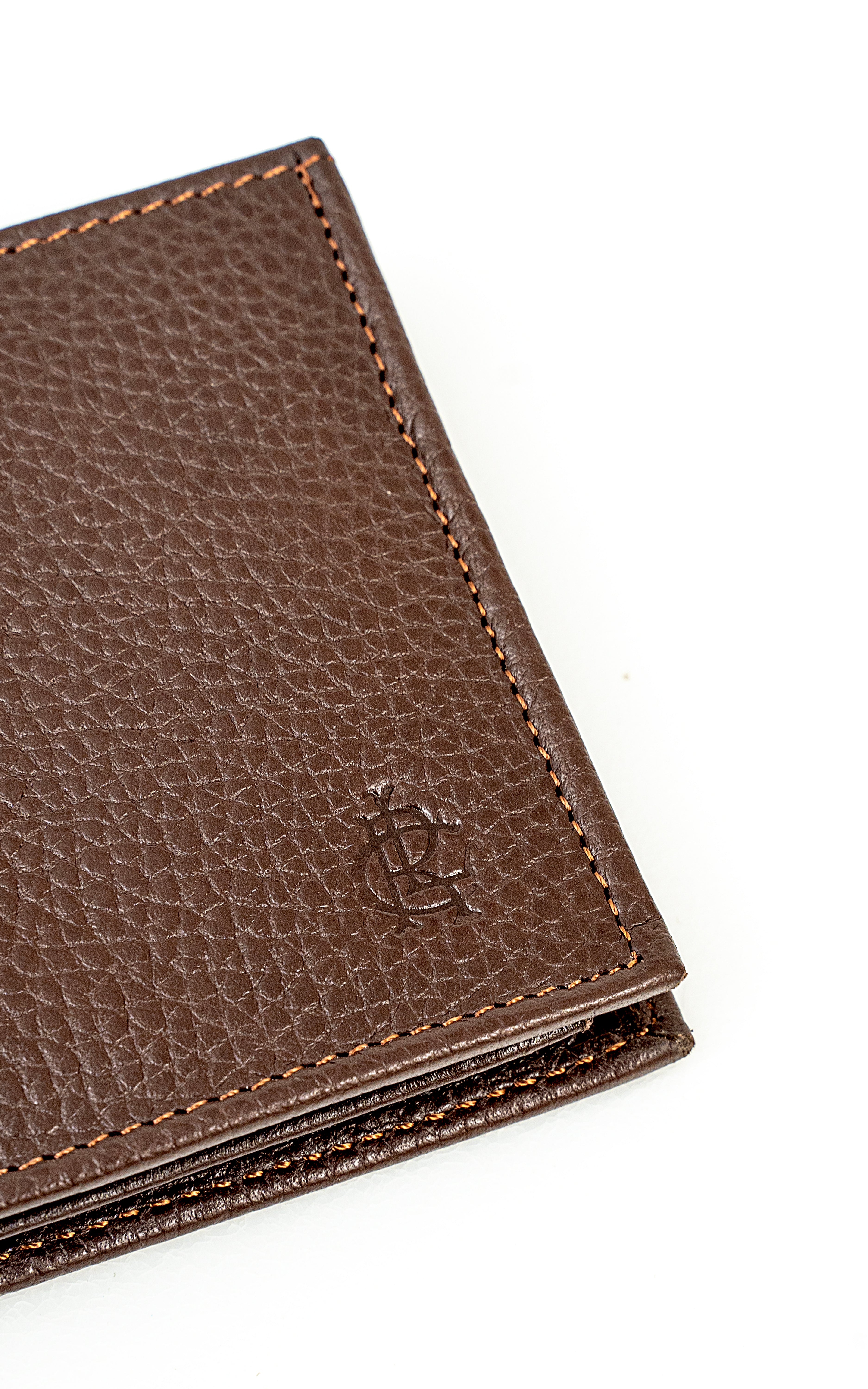 Brown leather wallet close-up of embossed logo on front