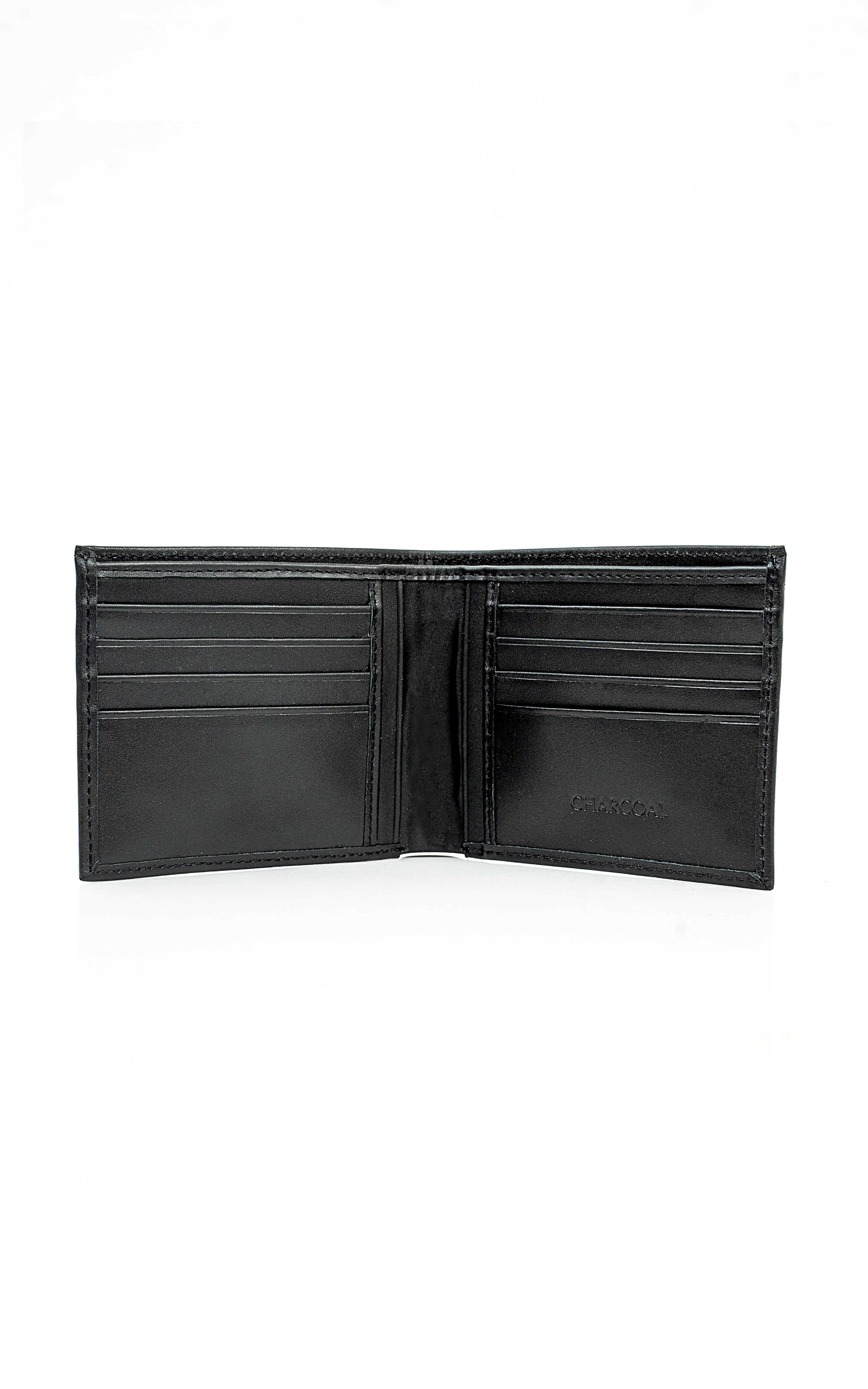 Black leather bifold wallet interior with card slots and center divider