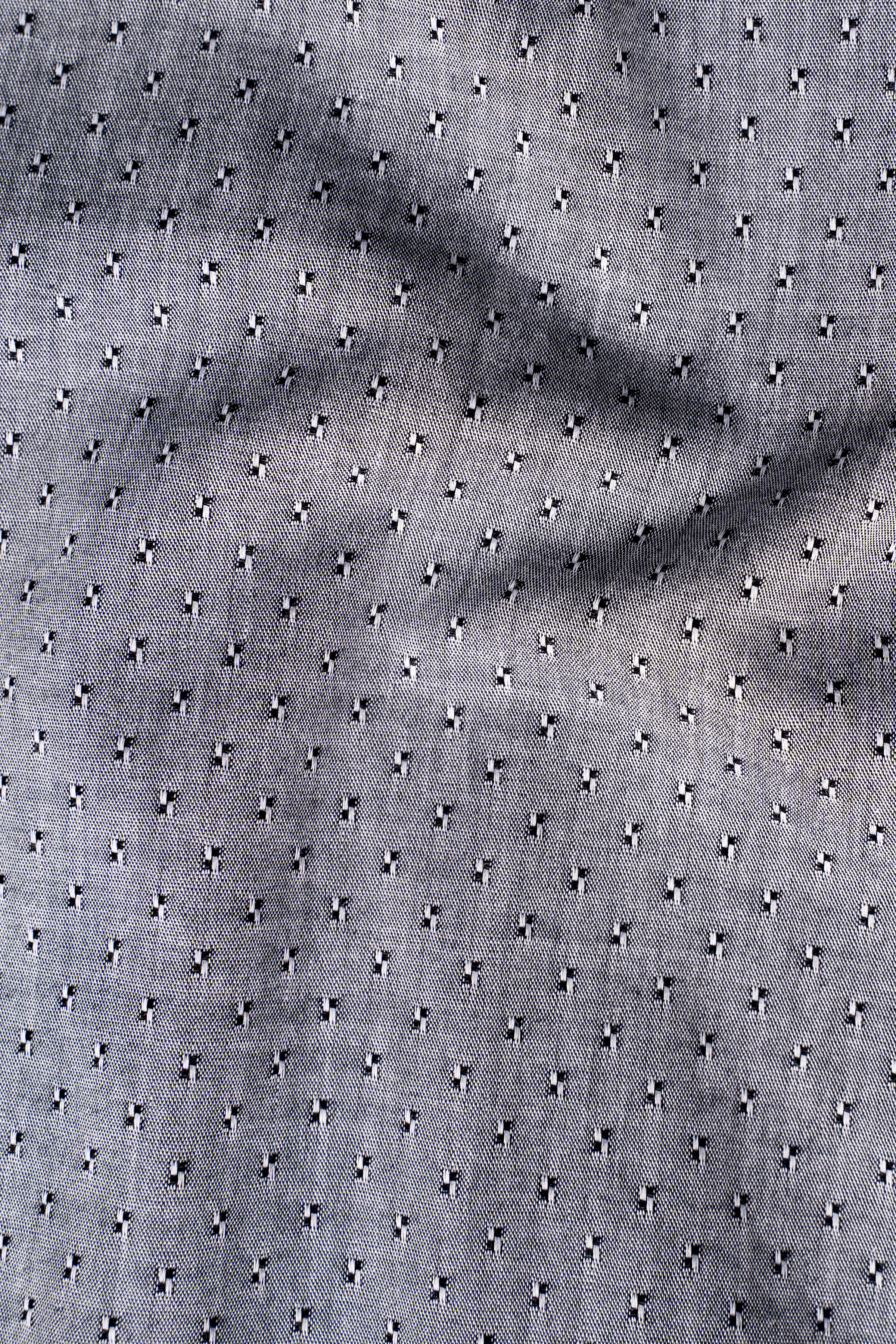 Grey shirt fabric with tiny repeating dot-and-line pattern
