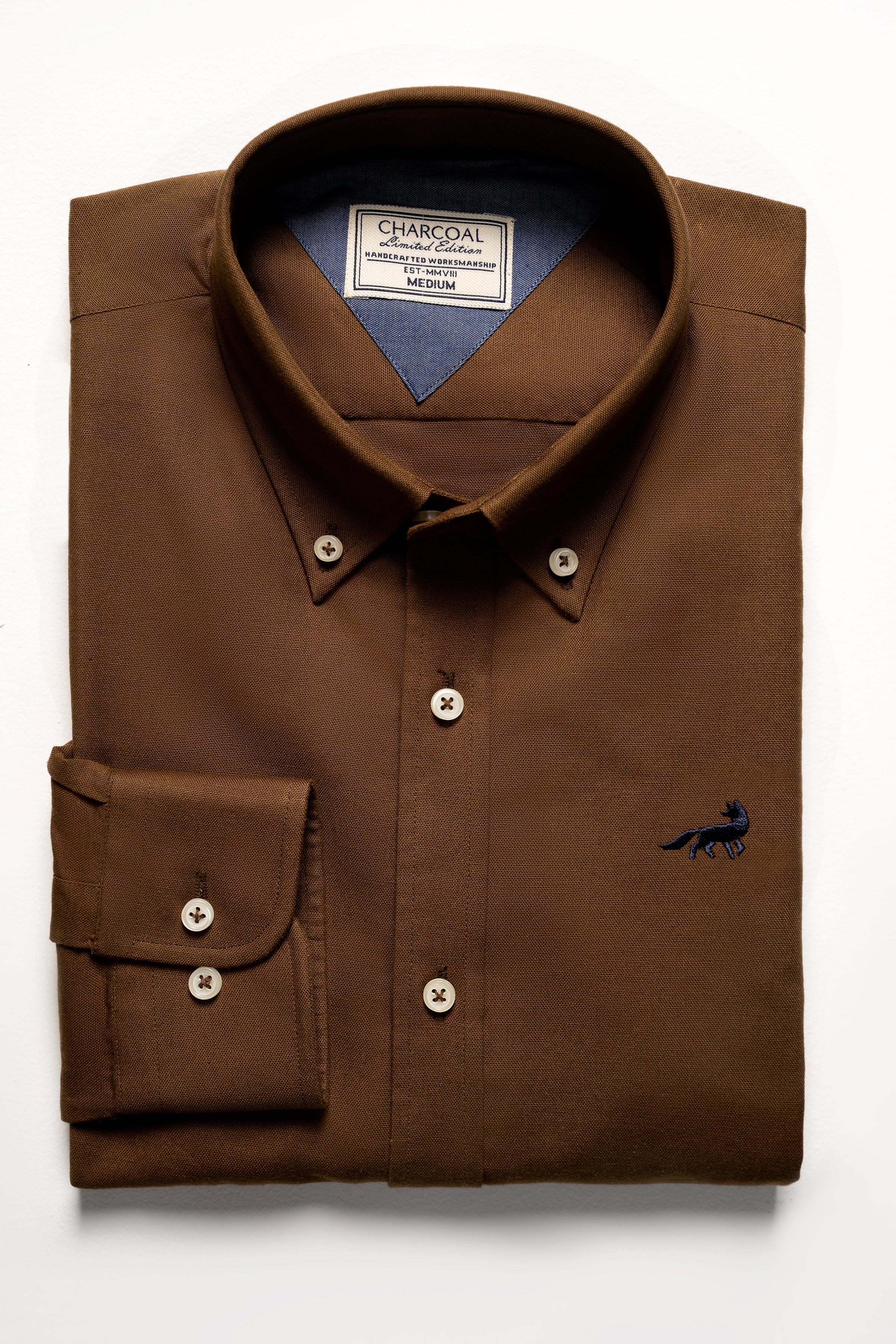 Brown button-up dress shirt with chest pocket and small logo