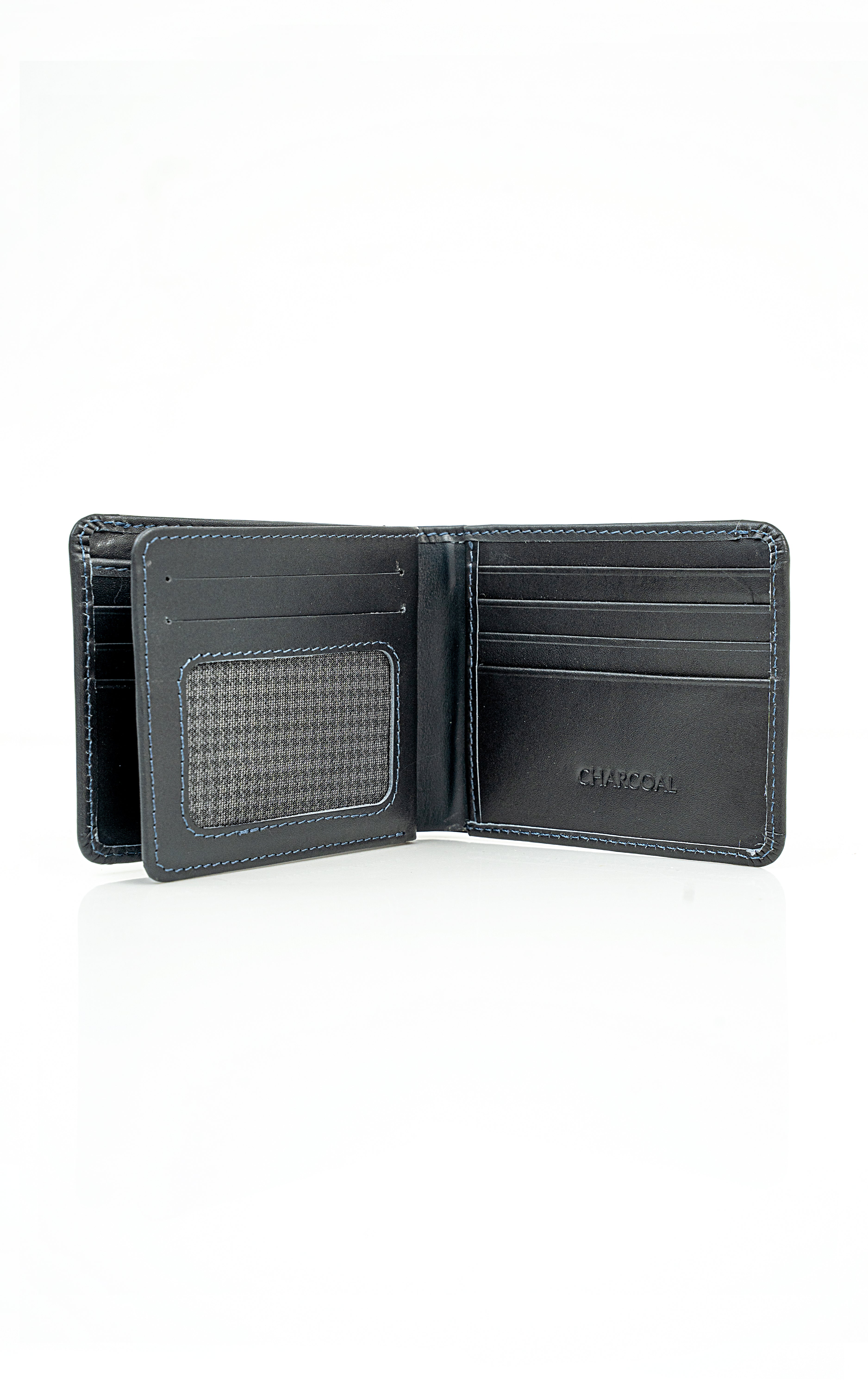 Open leather bi-fold wallet showing card slots and bill compartment.