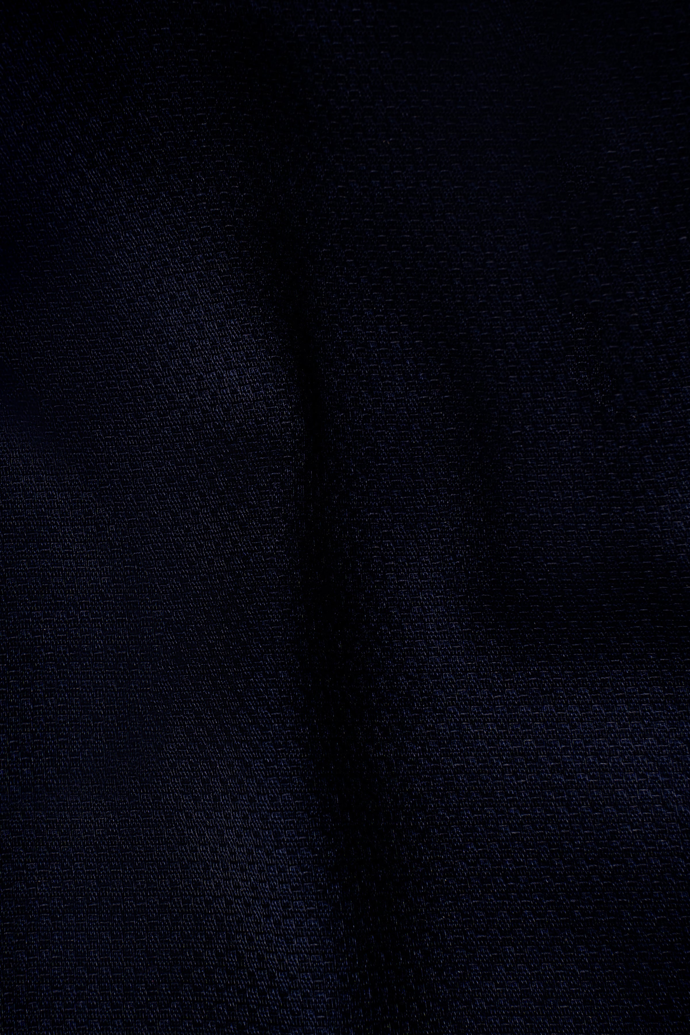 Navy blue shirt fabric texture close-up