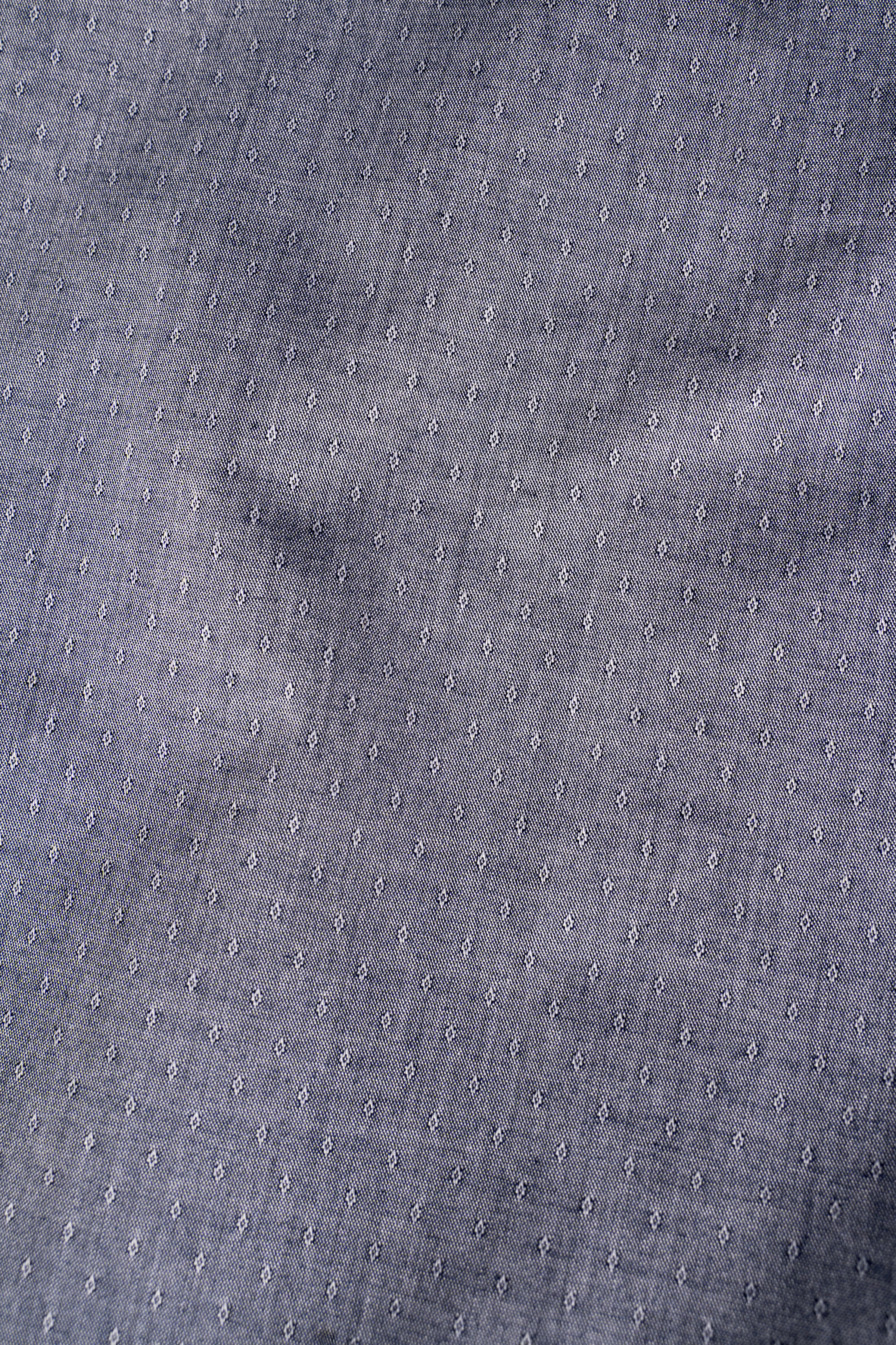 Grey shirt fabric with small all-over dot pattern