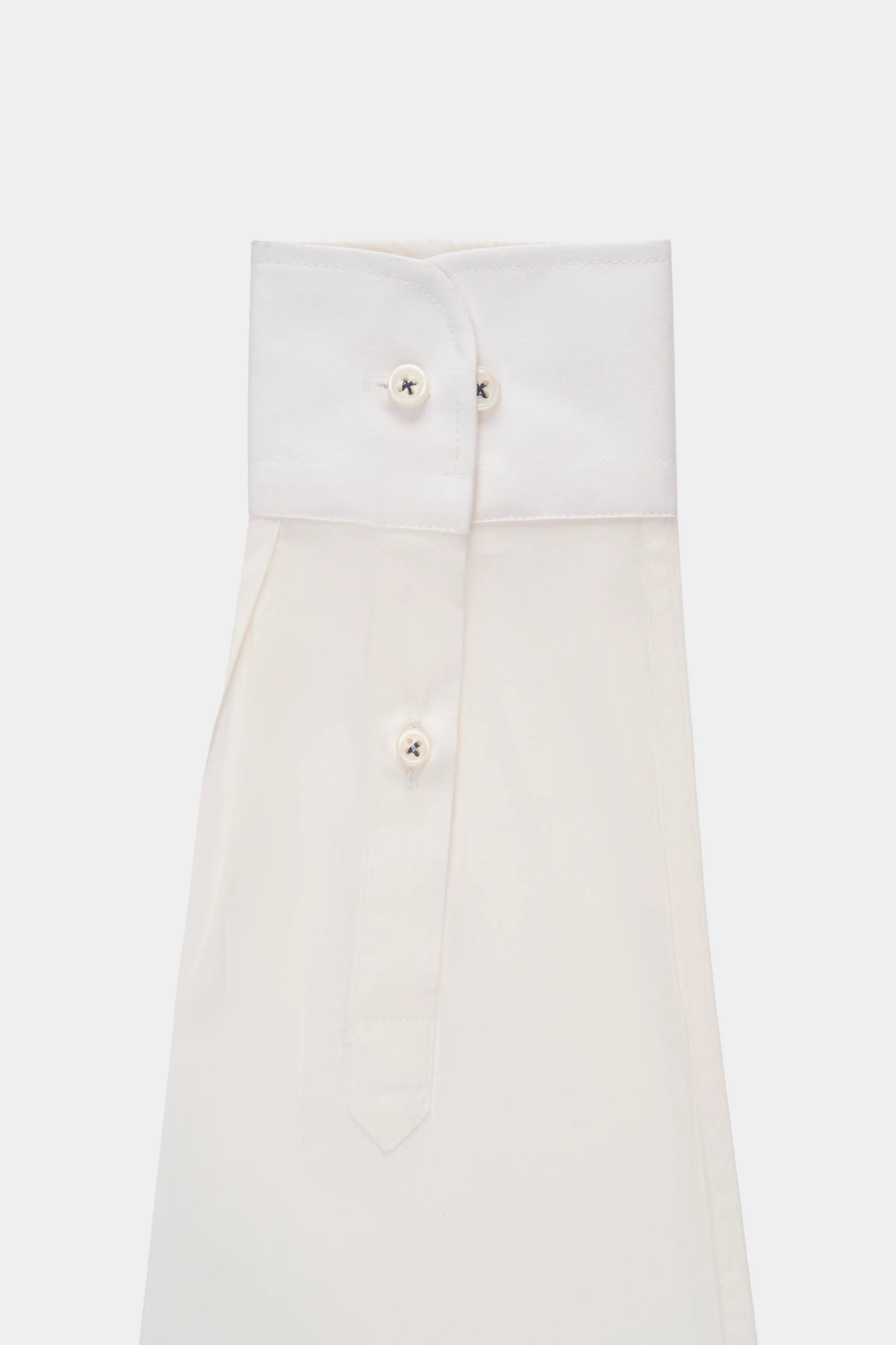 Off-white French collar shirt with cuff-style sleeves and center buttons
