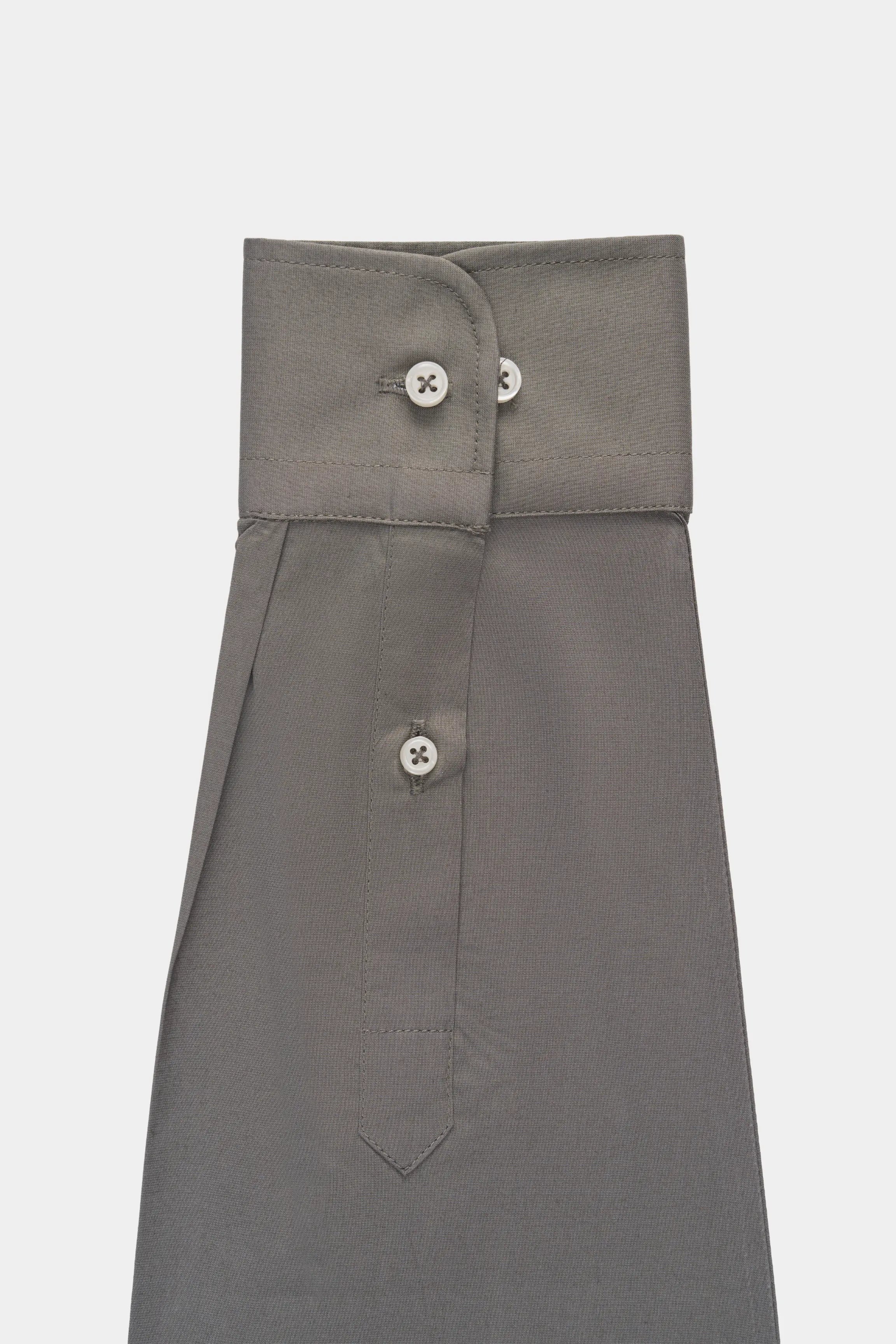 Dark olive-green smart shirt with buttoned front, stand collar, and yoke