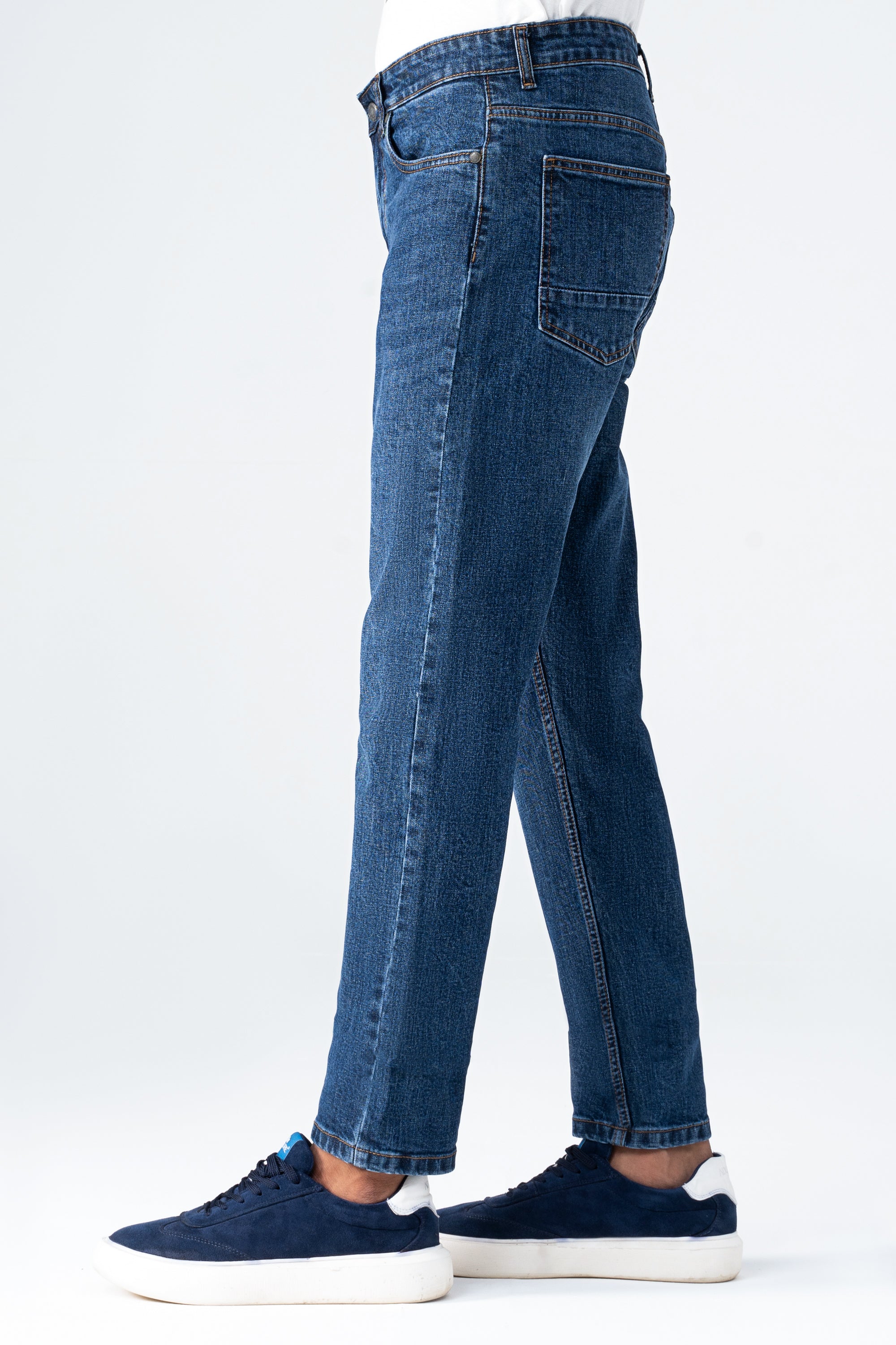Mid blue straight-leg denim jeans, back yoke, two rear pockets, belt loops.