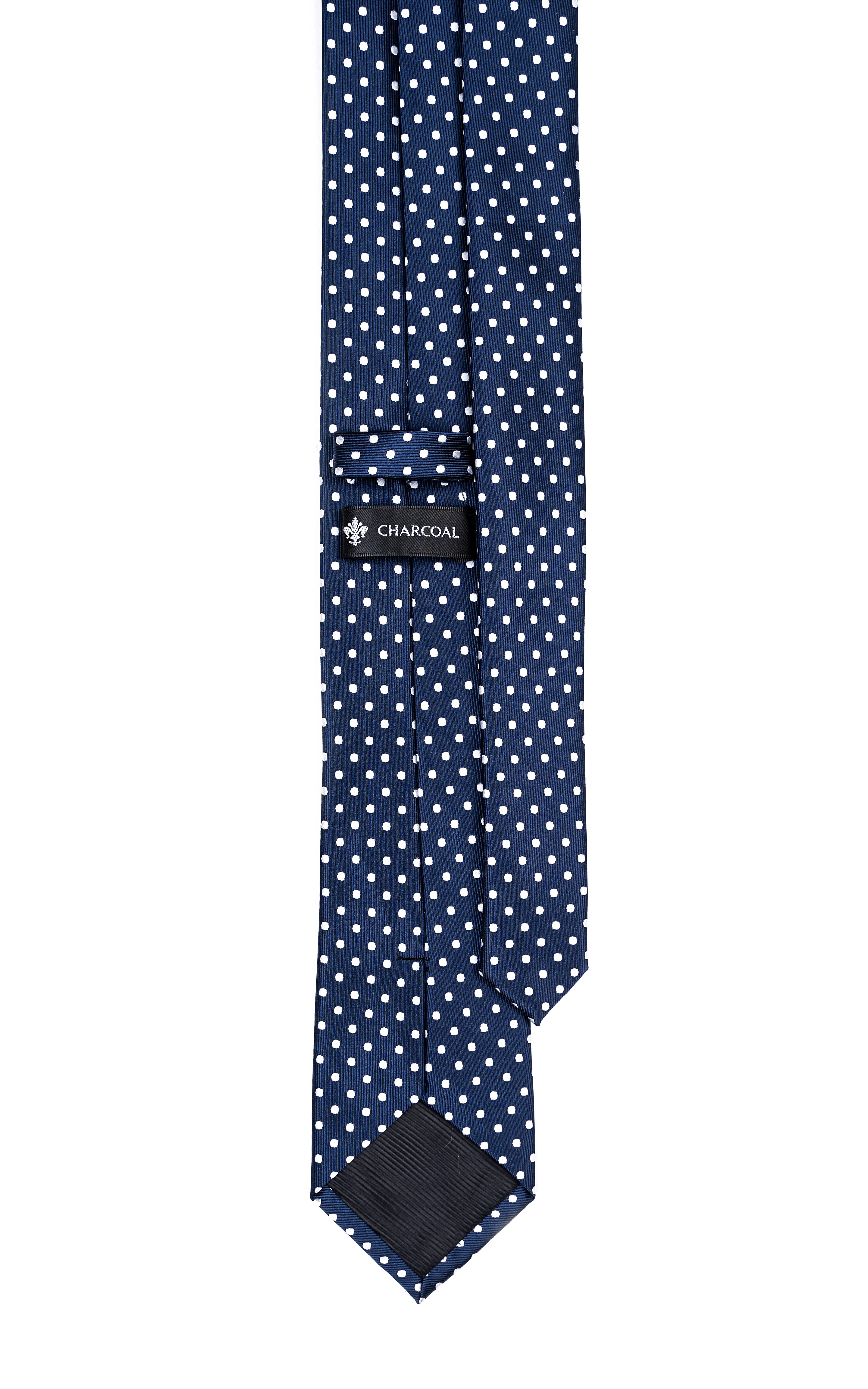 Navy polka-dot necktie with white dots and a CHARCOAL label at the knot.