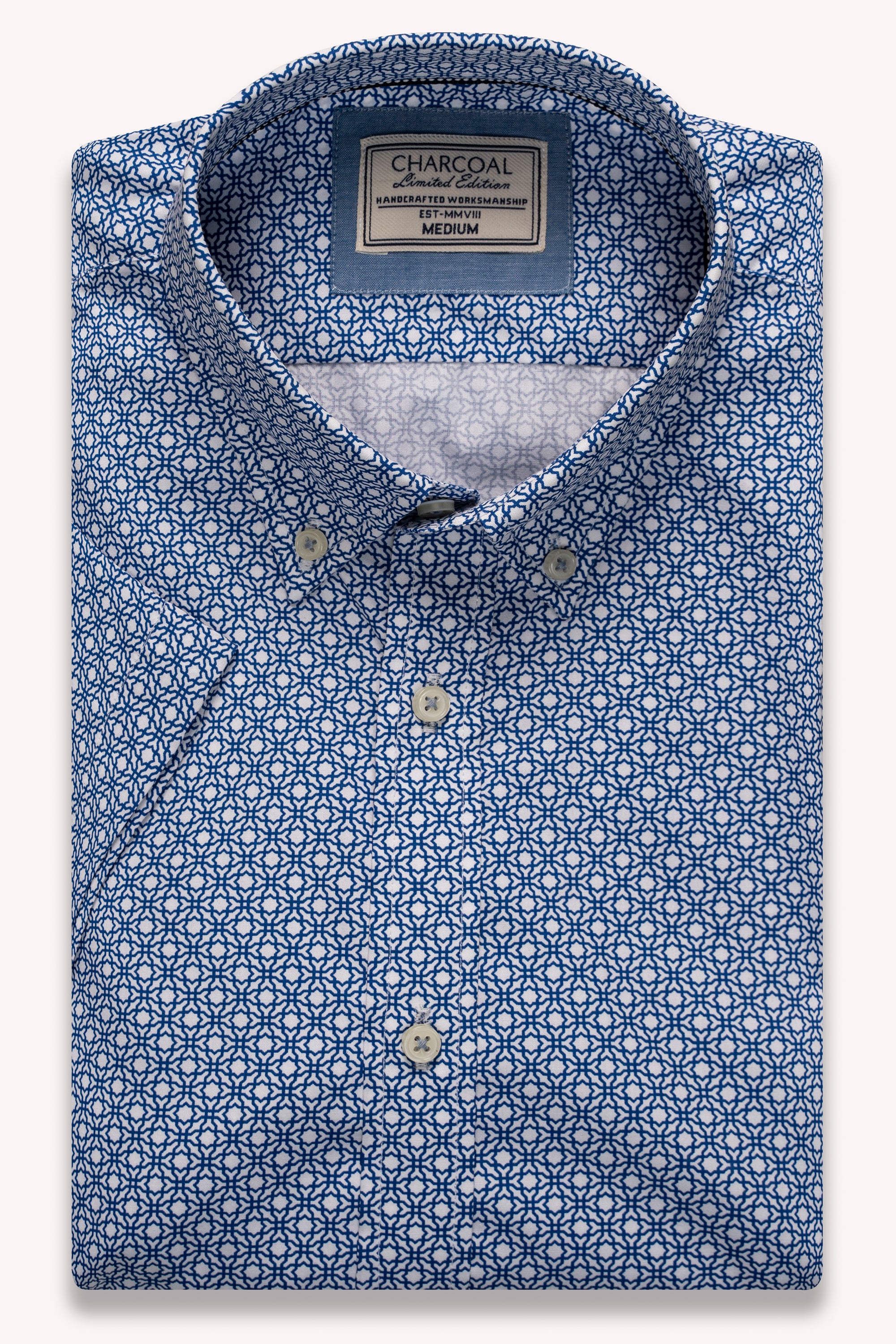 Limited edition half-sleeve shirt in navy with white geometric pattern, button-front