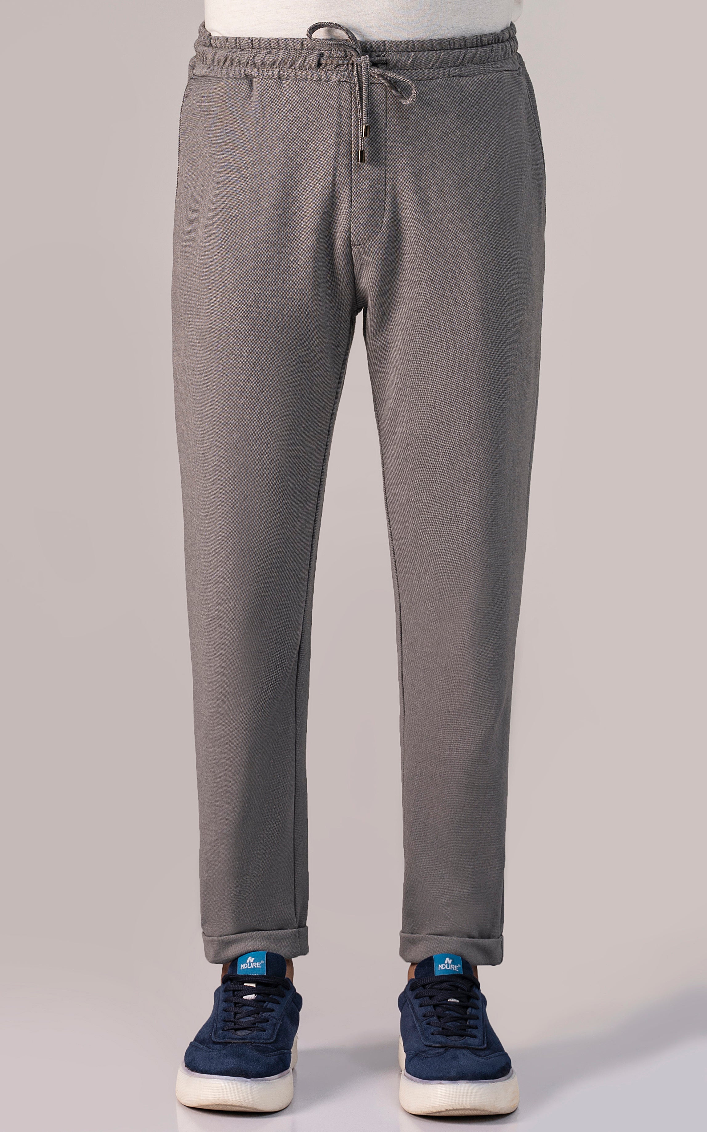 Grey melange interlock trouser with elastic waistband and drawstring, tapered legs