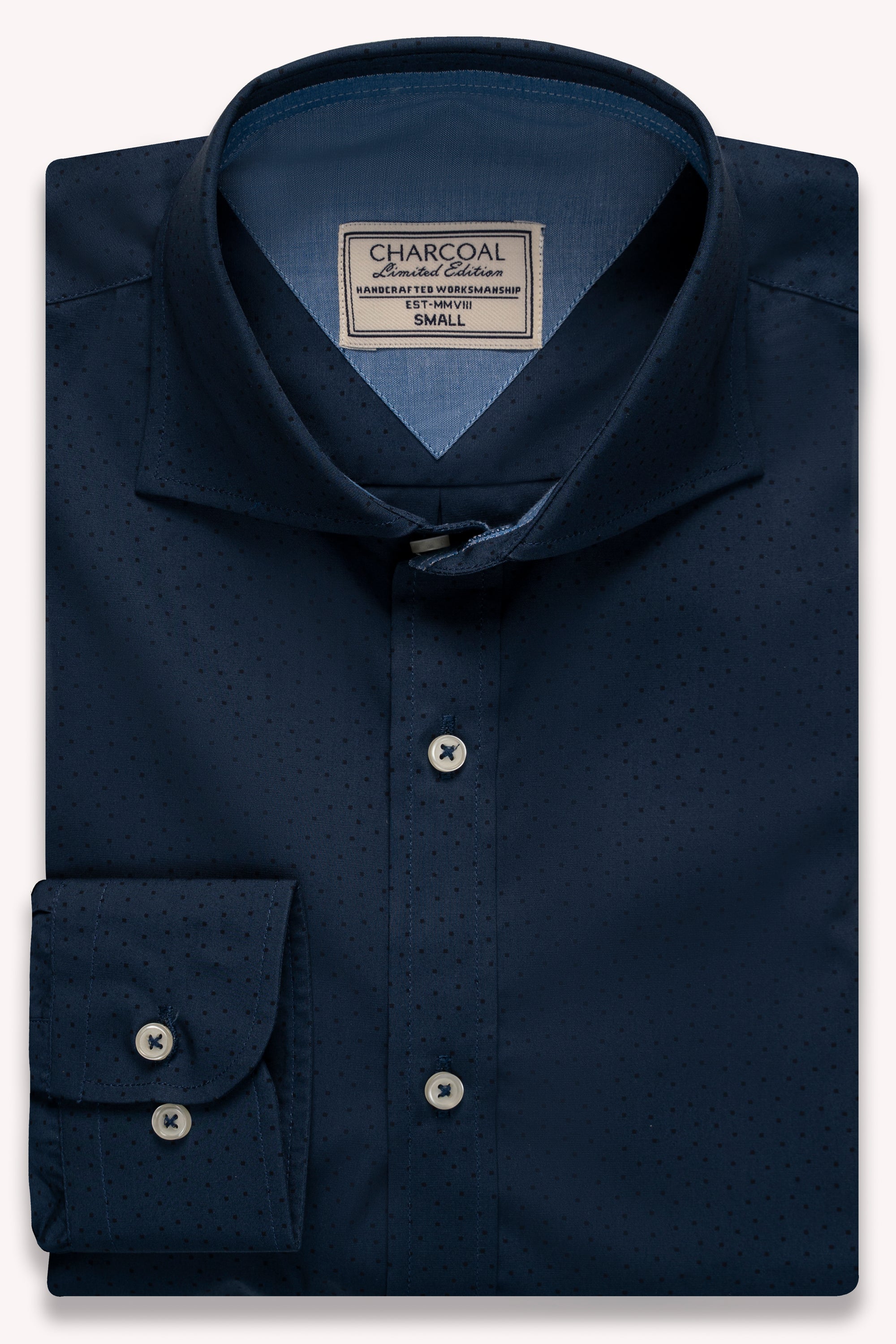 Blue button-up shirt with buttoned placket, collar, and small dotted texture