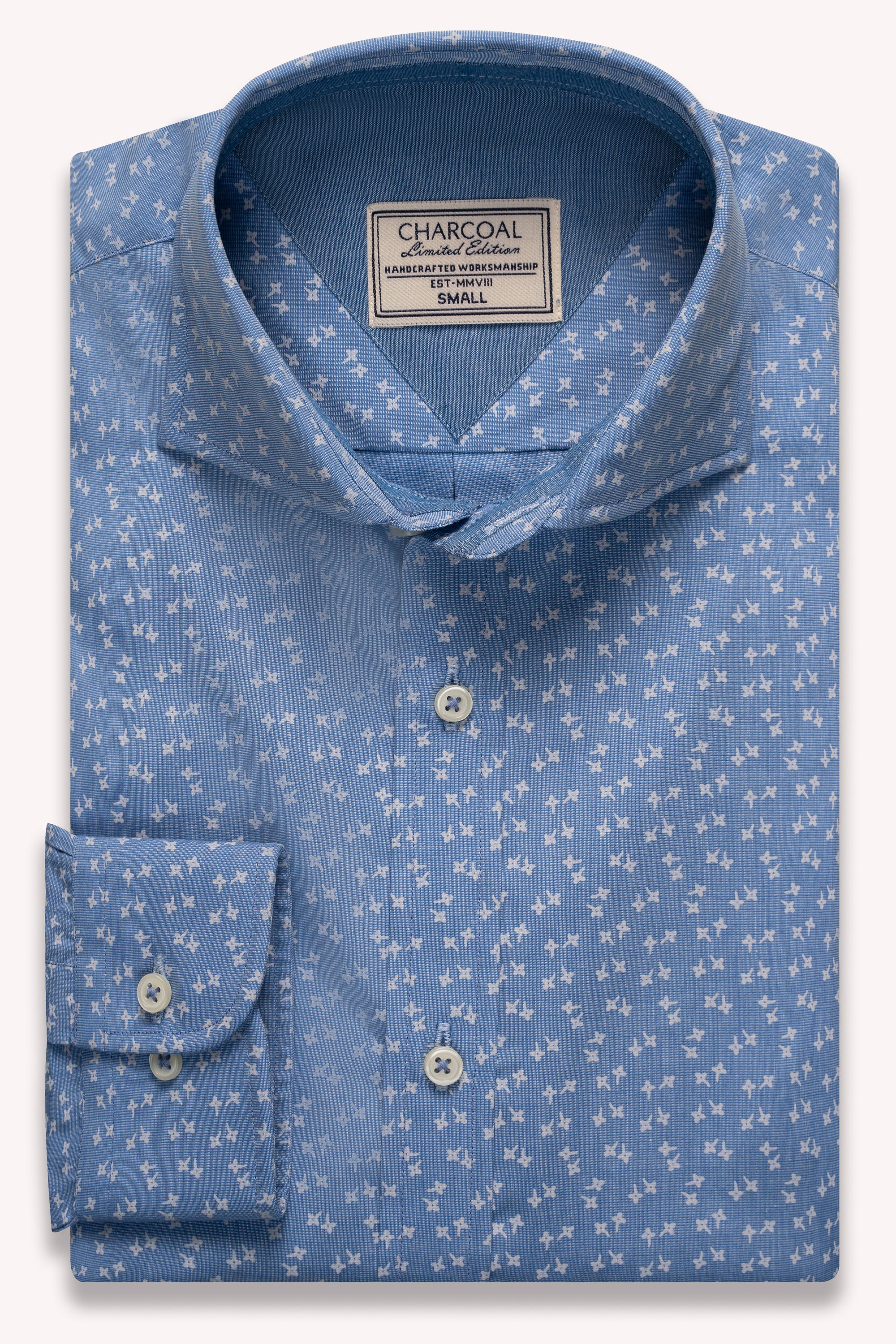Sky blue printed shirt with spread collar and button front, small star pattern