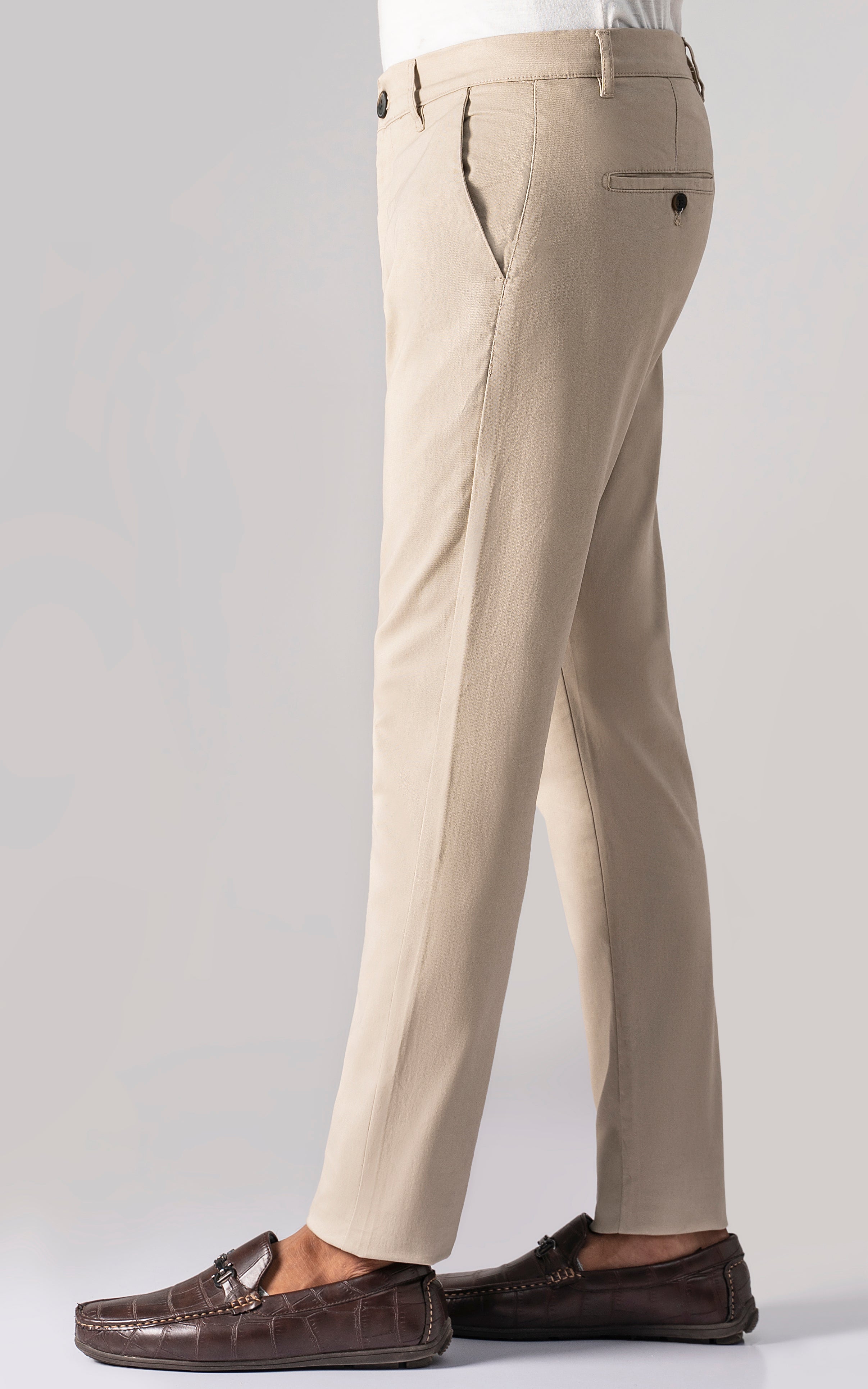 Light khaki casual trousers with cross pockets, button closure, belt loops, straight legs
