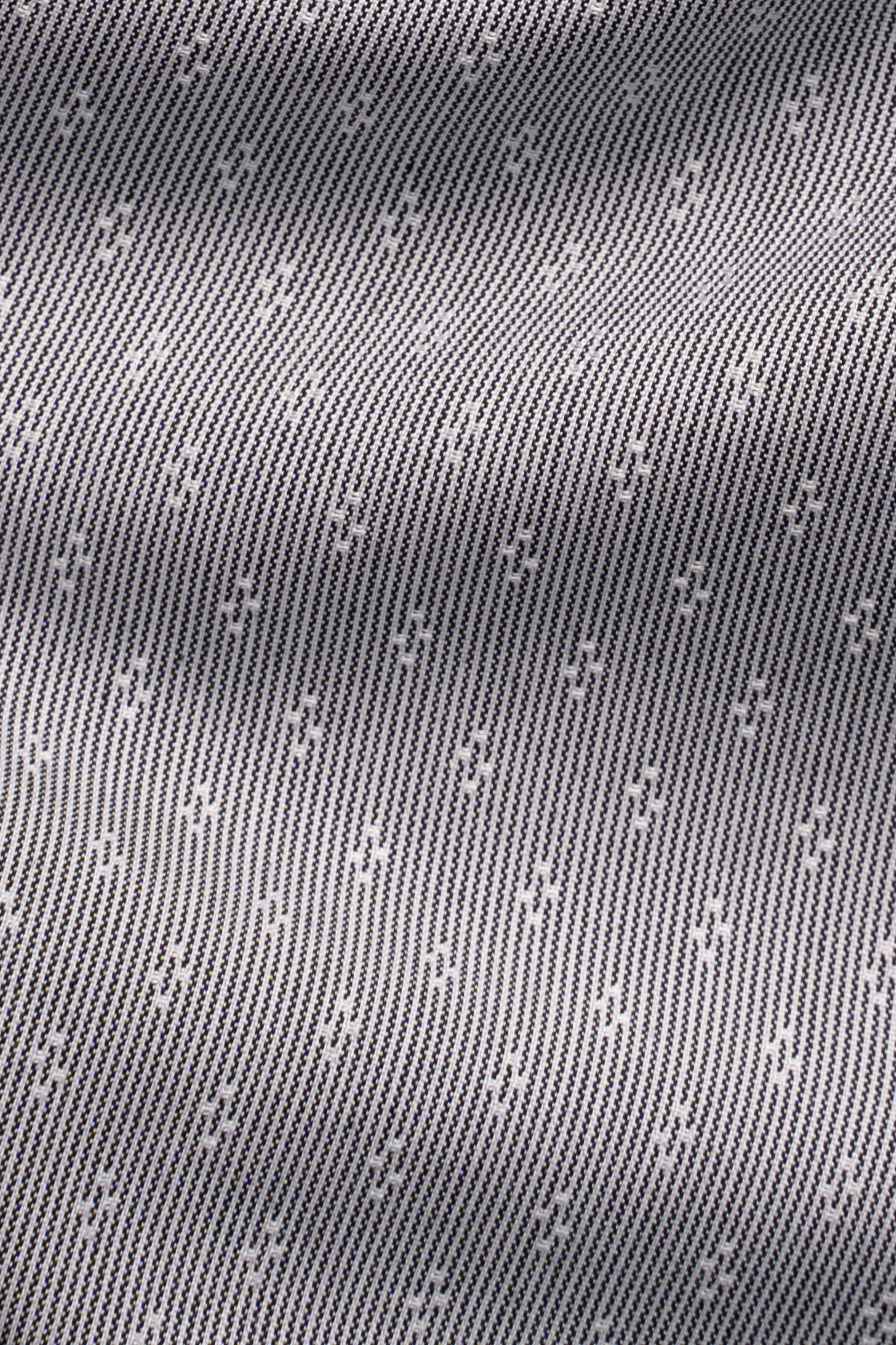 Grey shirt fabric with subtle textured dot pattern