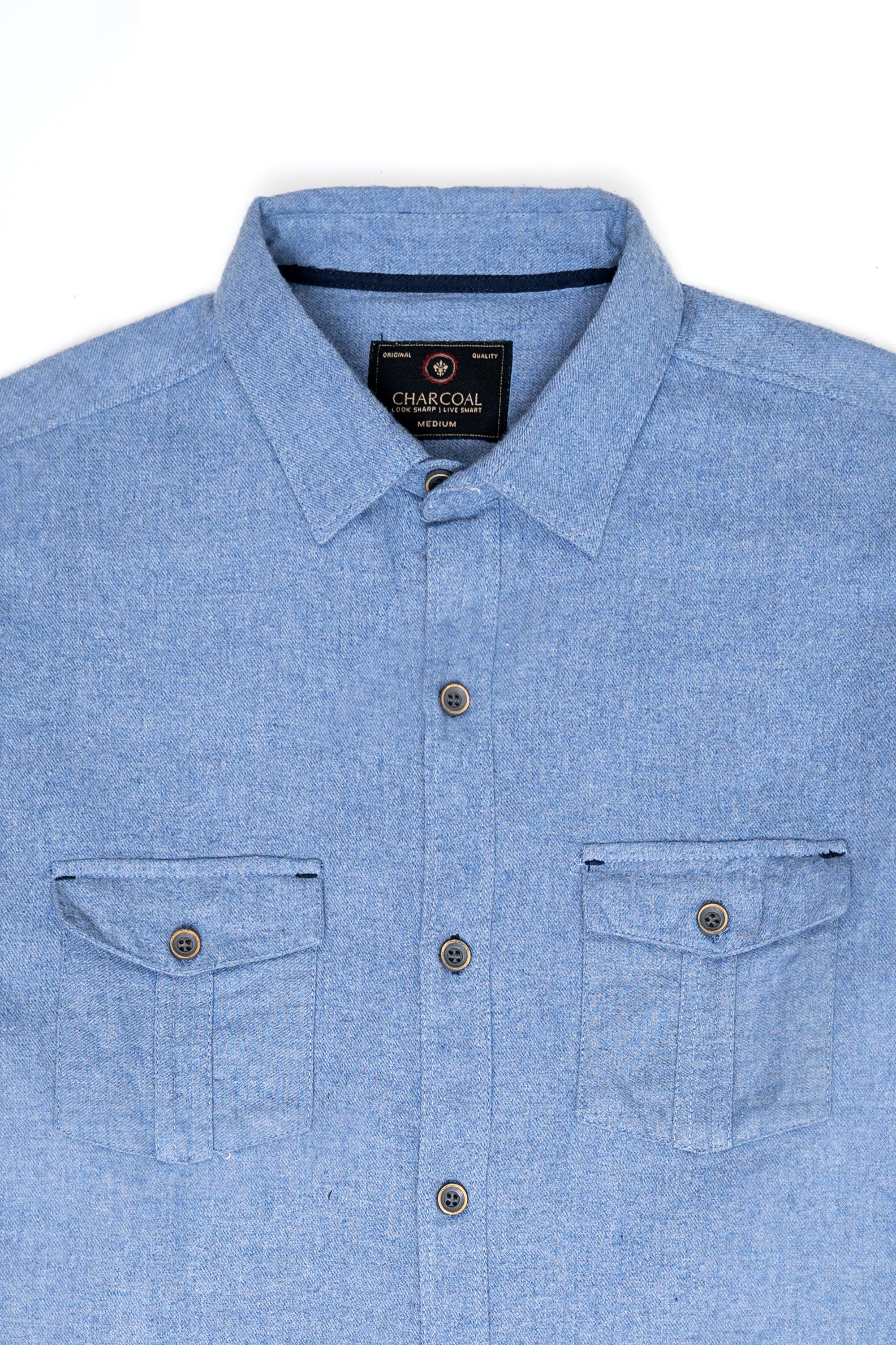 Sky blue casual button-up shirt front view with chest pockets and metal buttons