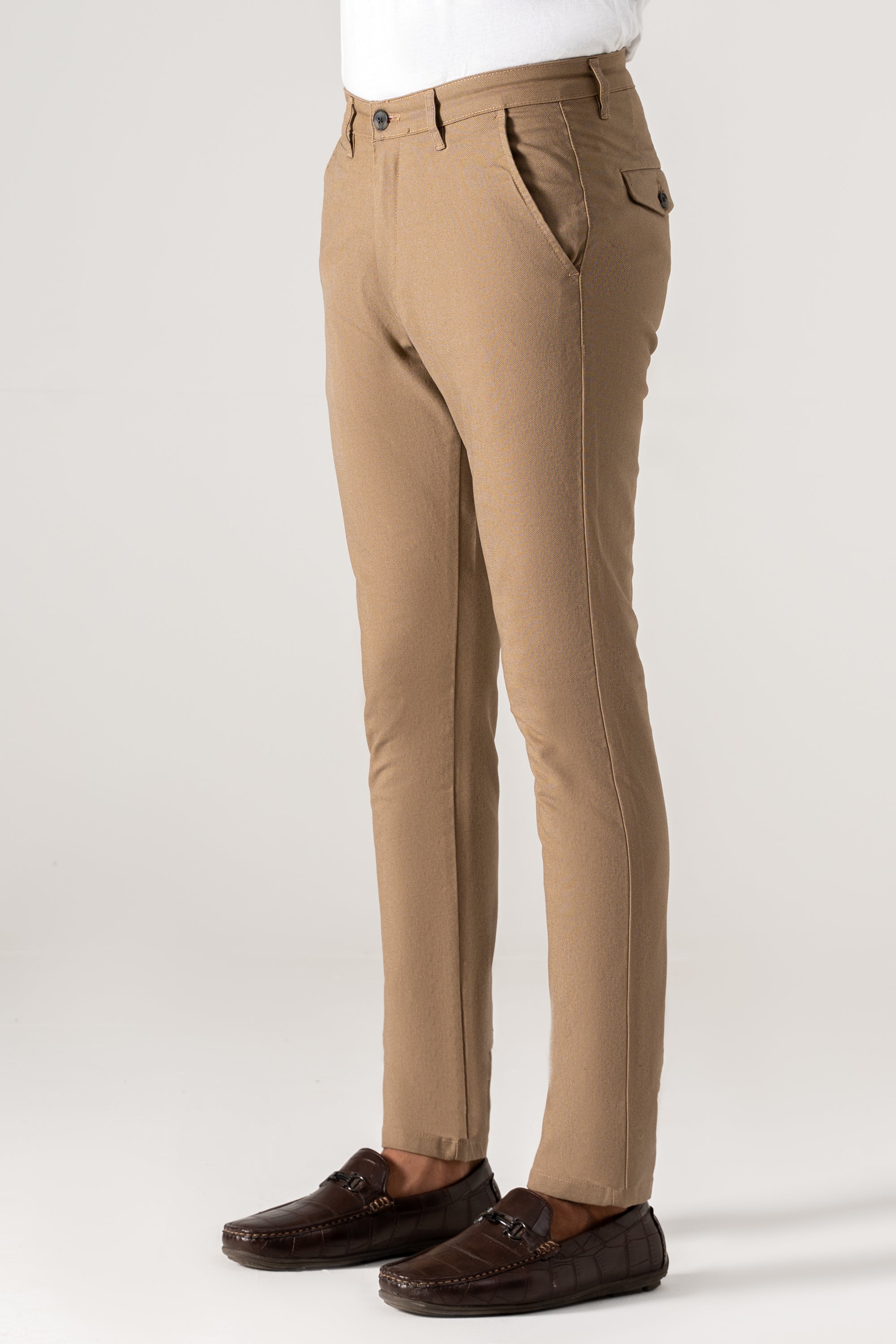 Khaki textured pants with side pocket detail and tapered straight leg