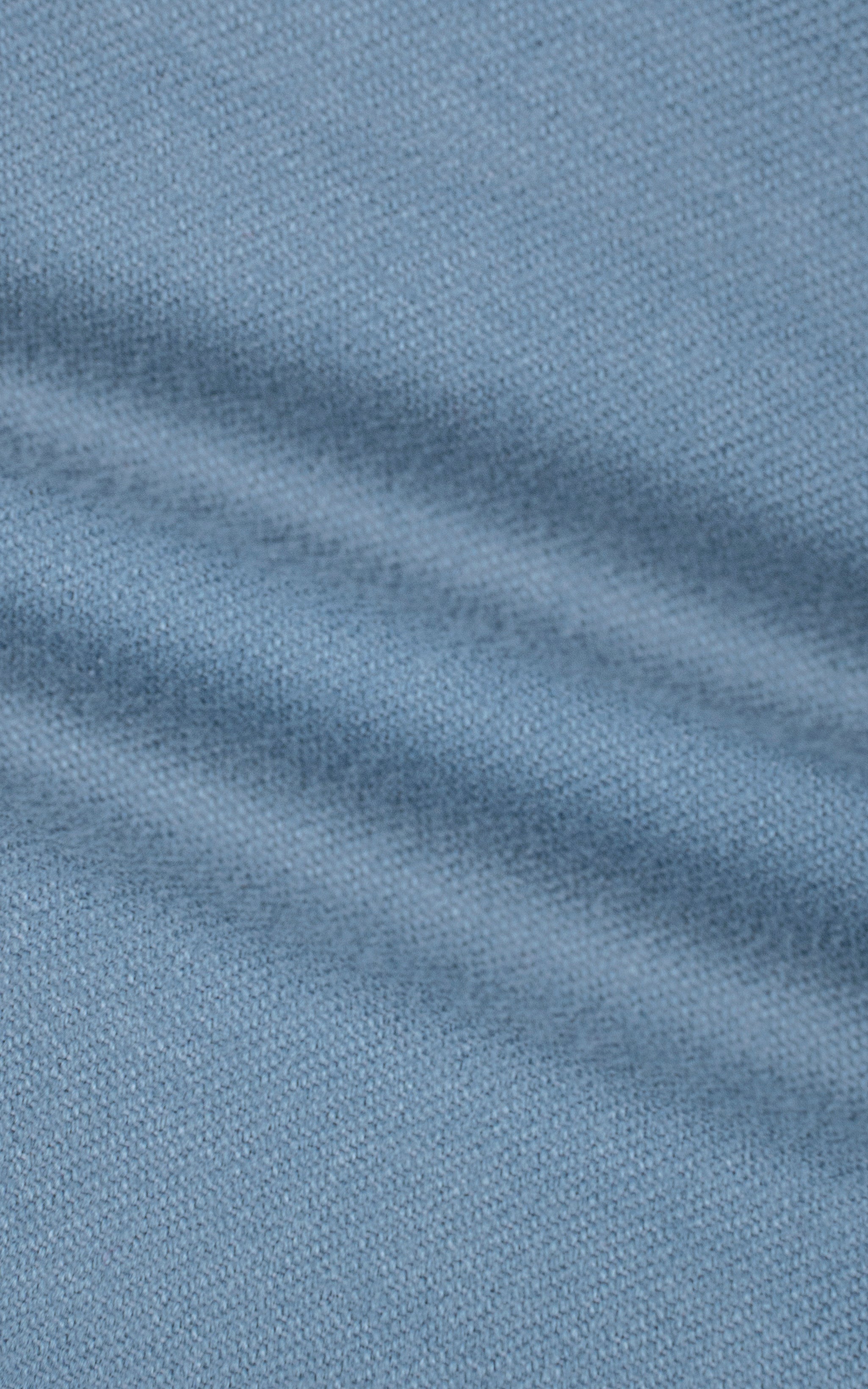 Sky blue shirt fabric texture close-up