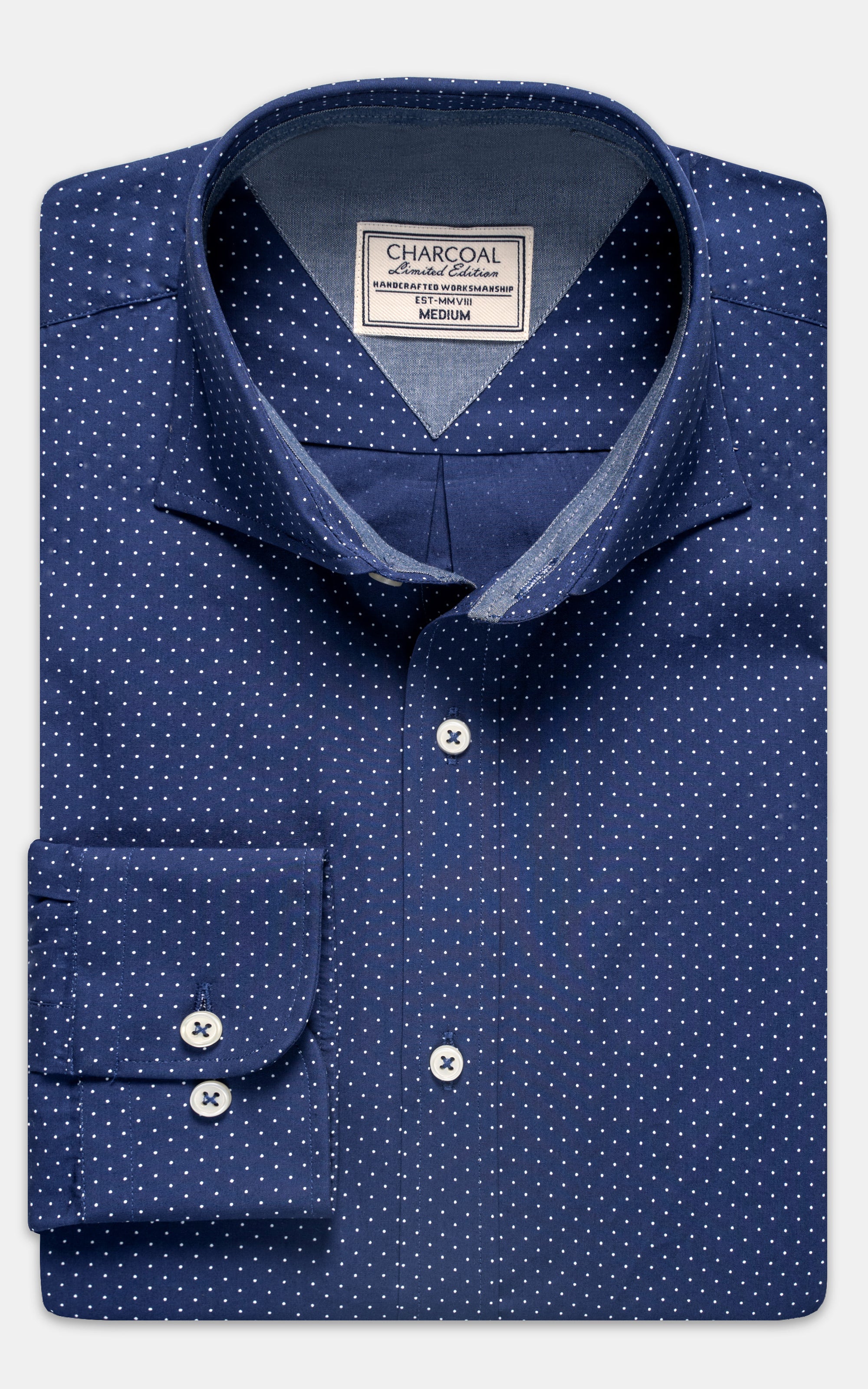 Navy blue dress shirt with white dot pattern, button-down collar and cuffs