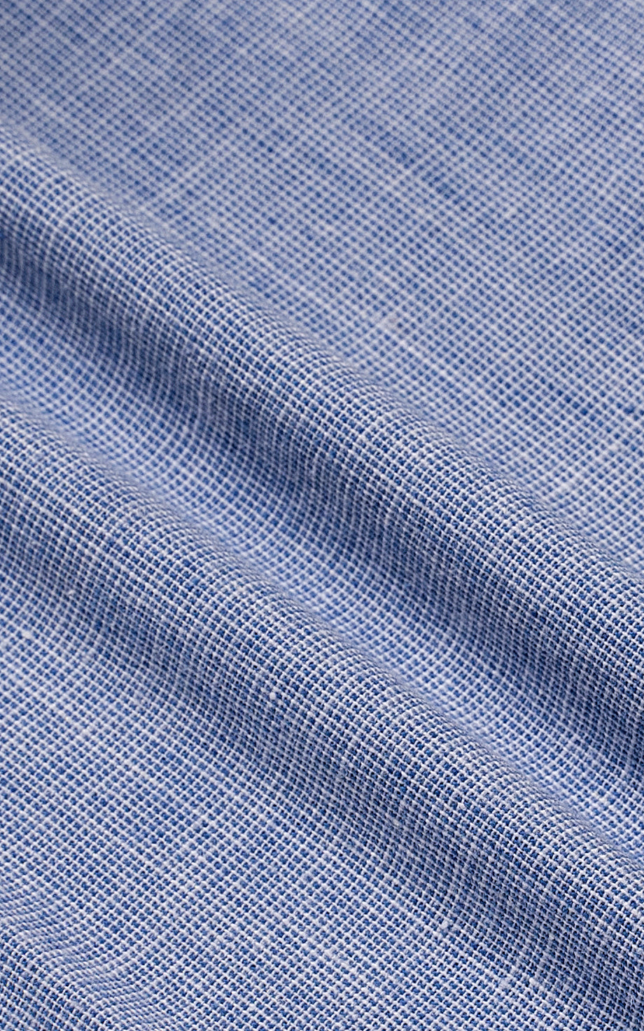 Linen chambray blue woven fabric texture close-up