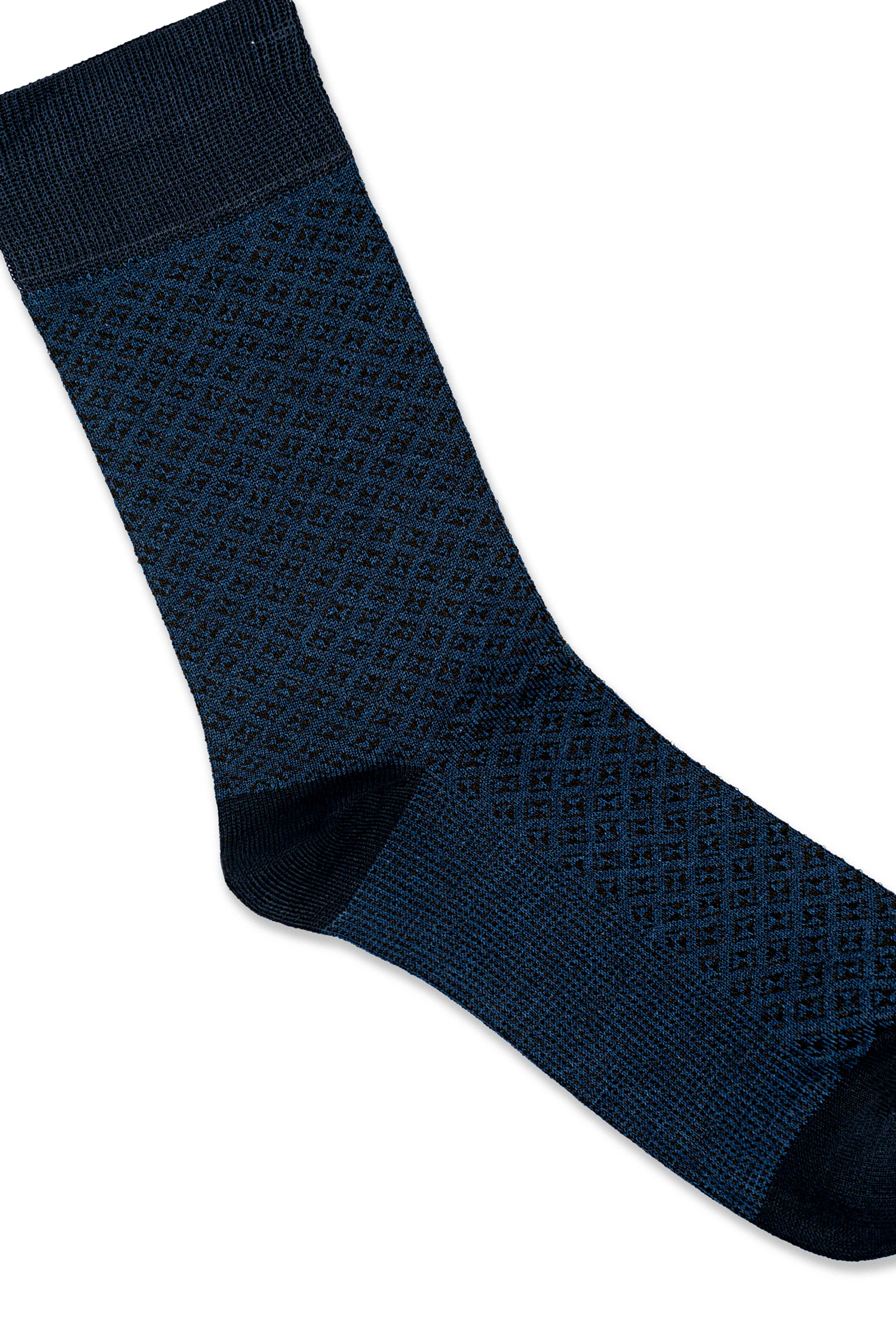 Navy patterned dress sock with diamond texture and dark toe seam, close-up