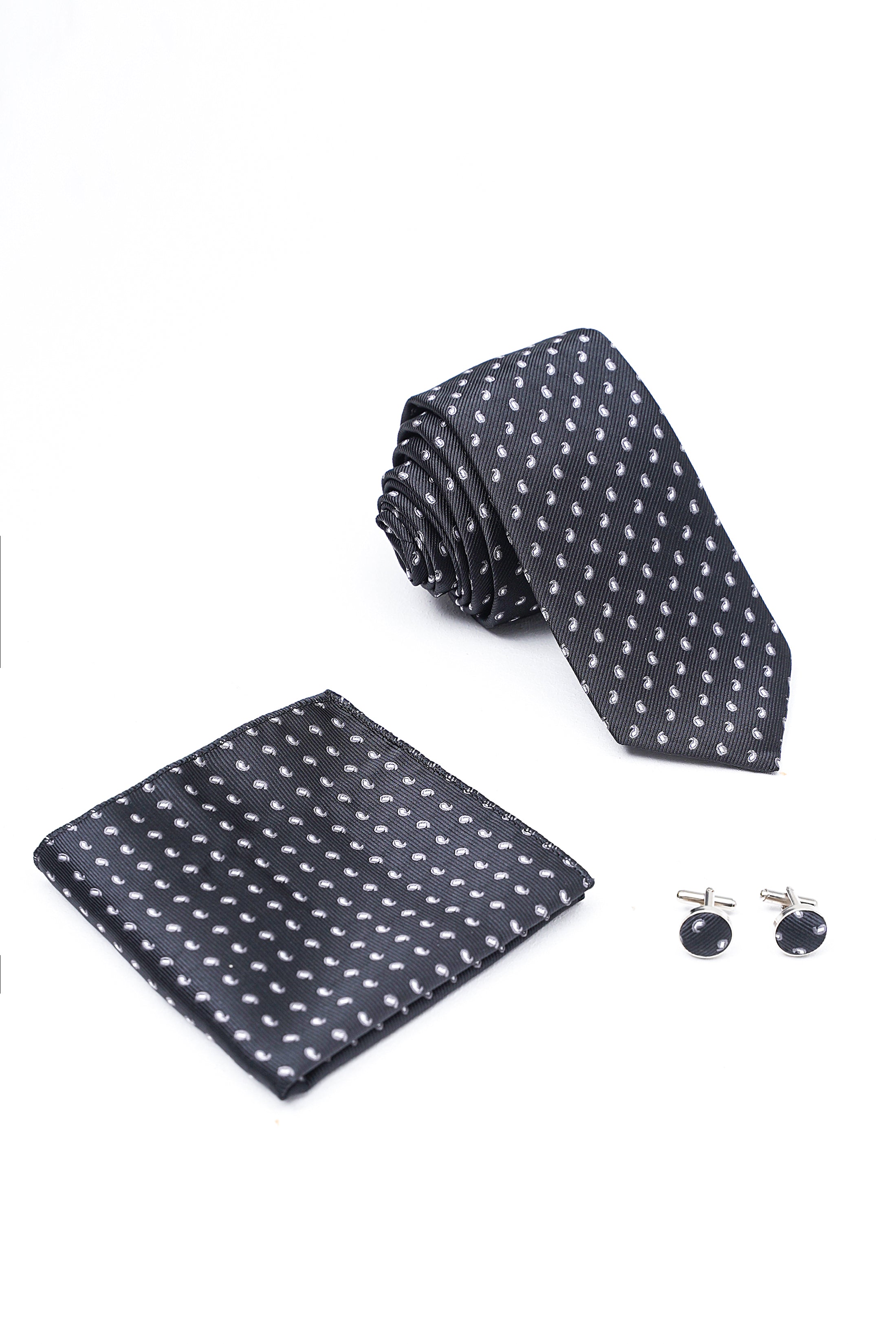 Dark tie set with dotted necktie, matching pocket square, and round cufflinks