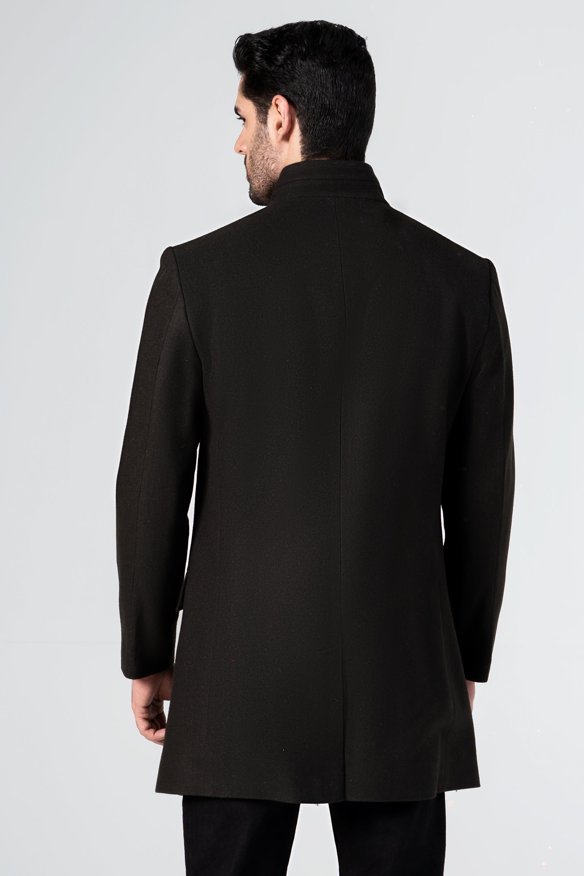 Dark olive wool long coat back view with stand collar and button closure