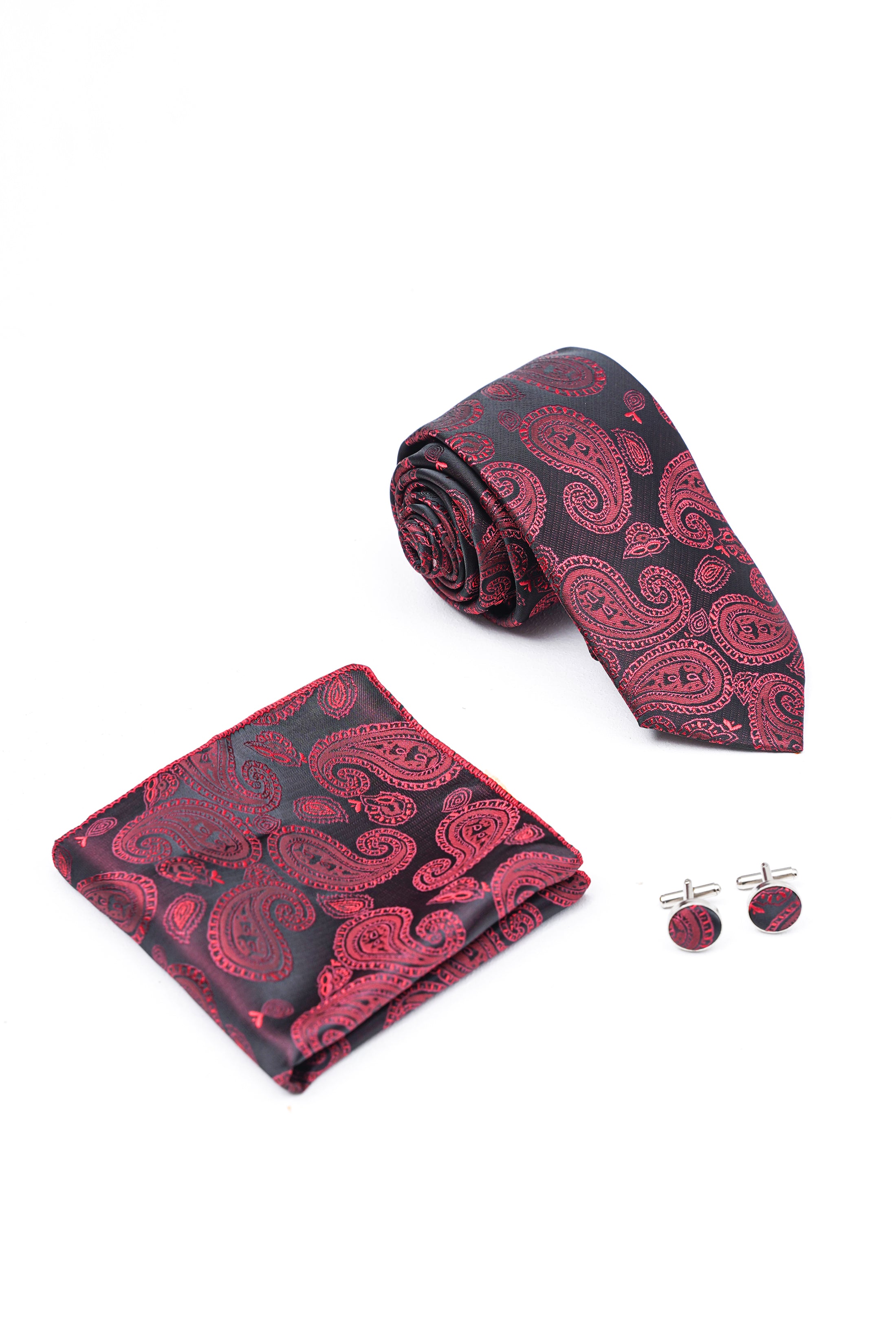 Burgundy patterned tie set with folded pocket square and cufflinks