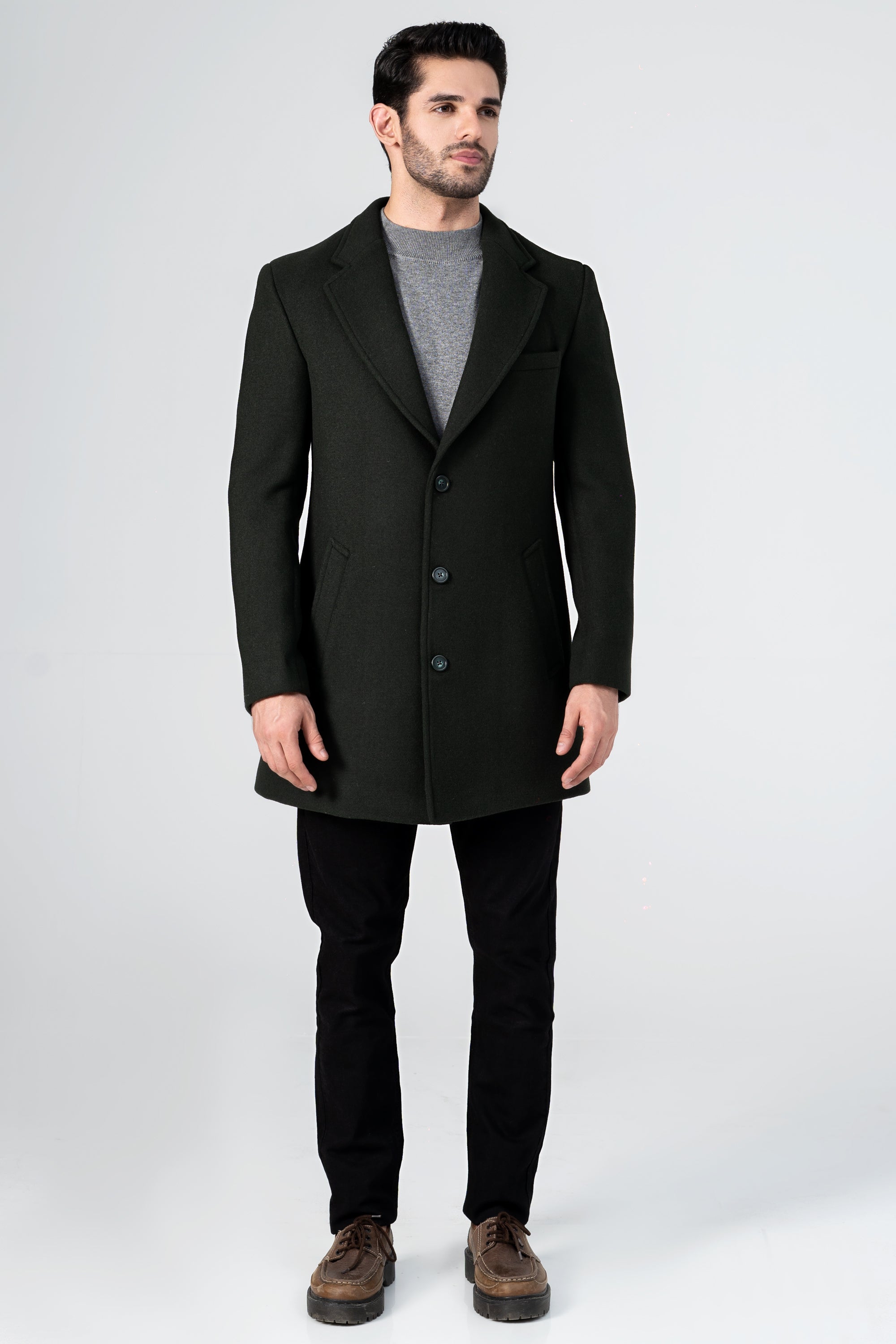 Dark green wool long coat with notched lapels, front buttons, and side pockets