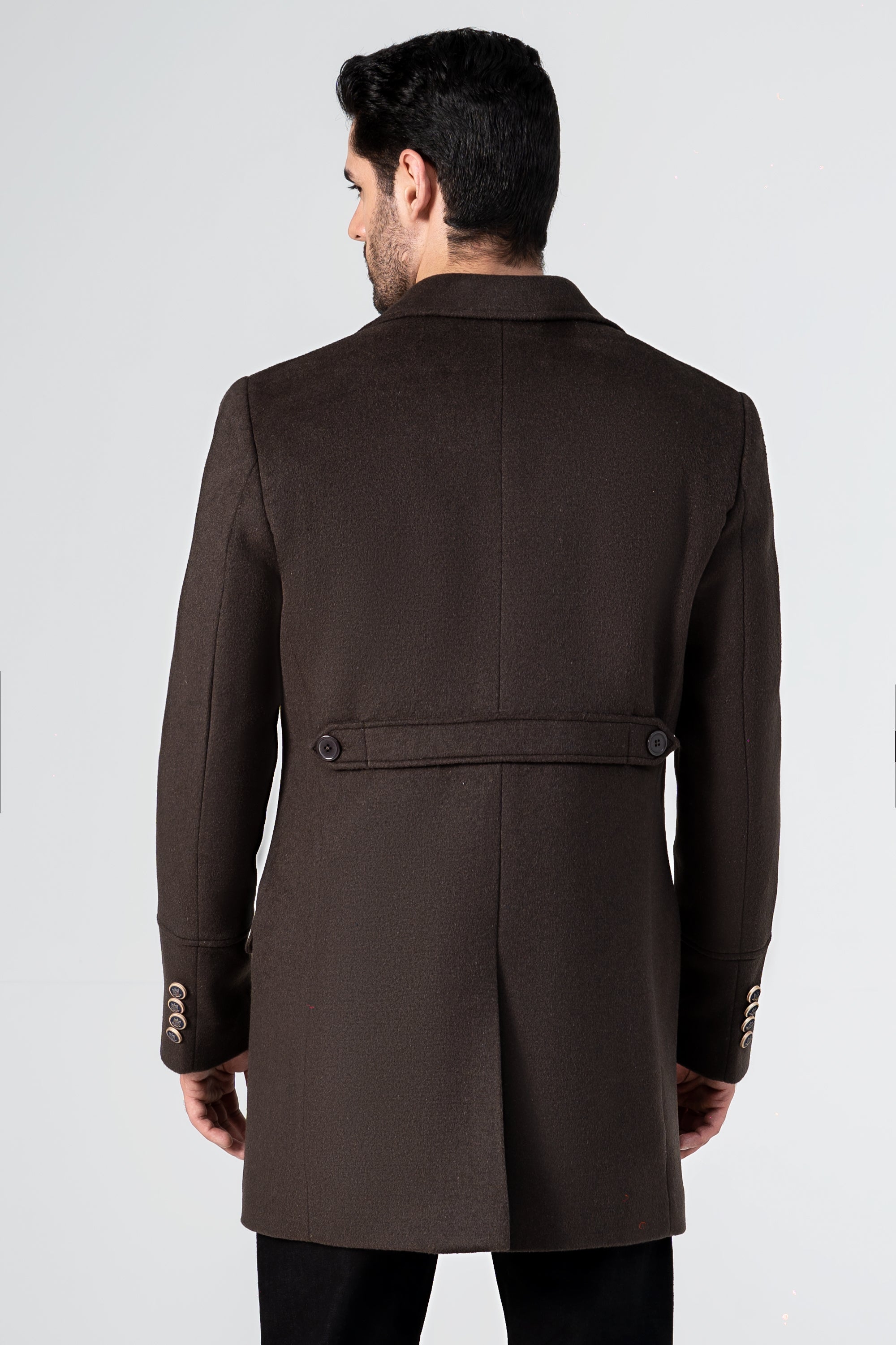Dark brown wool long coat, back view, belt strap across yoke