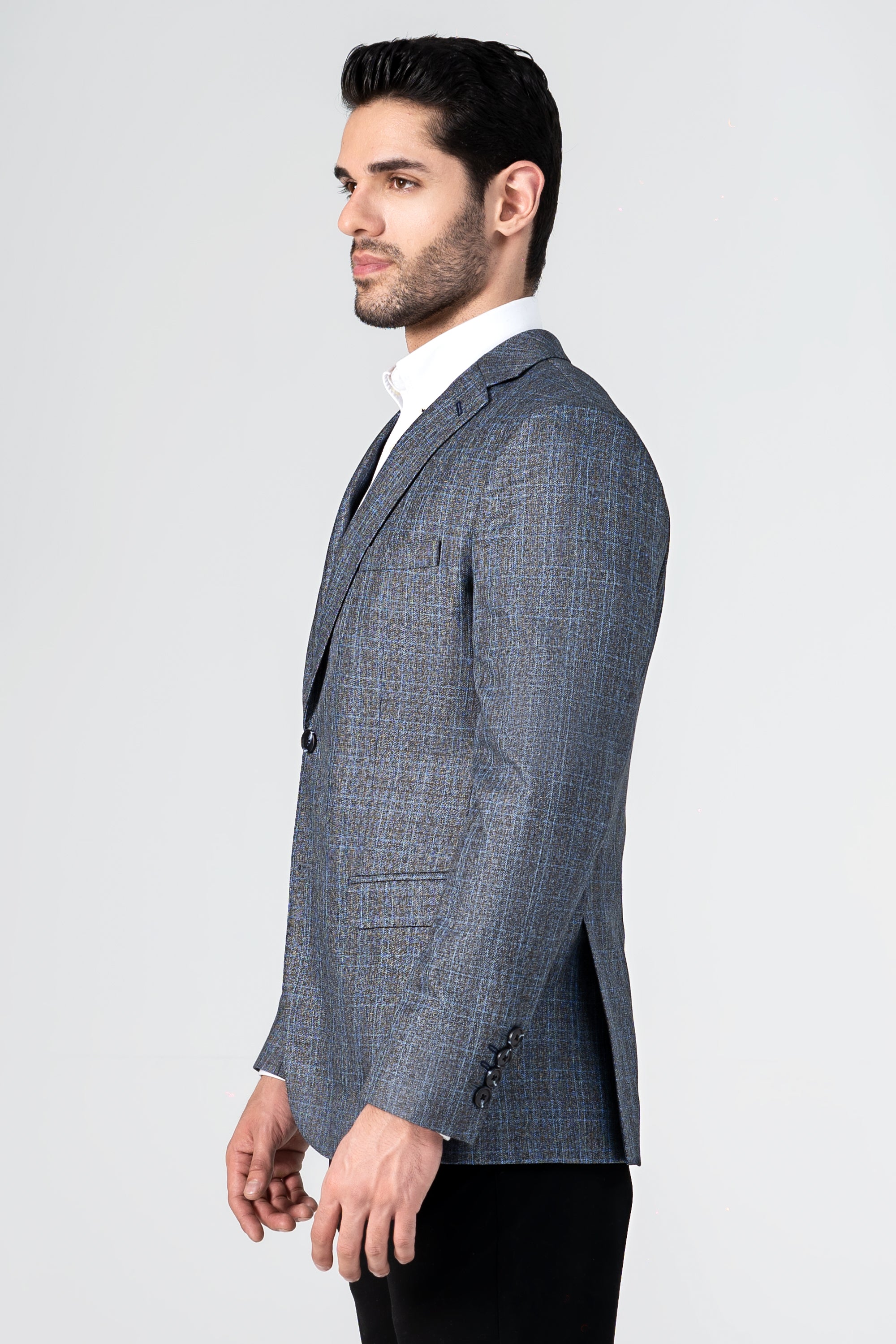 Grey-blue textured casual blazer with notch lapel and flap pocket detail, side profile.
