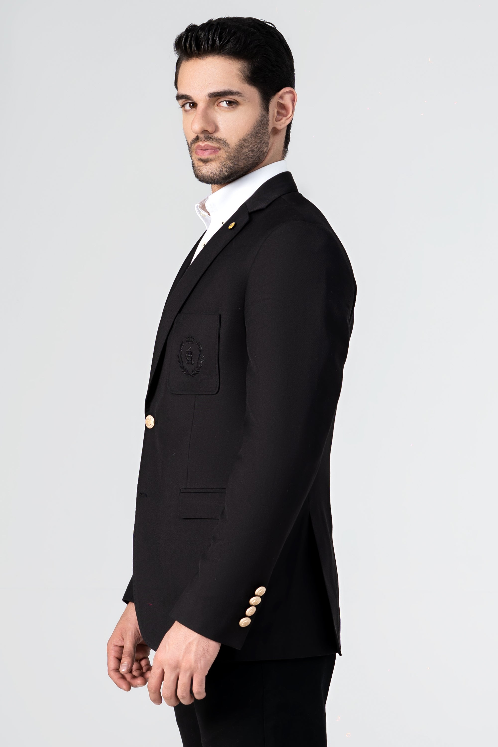 Black single-breasted casual coat with gold buttons and flap pocket detail