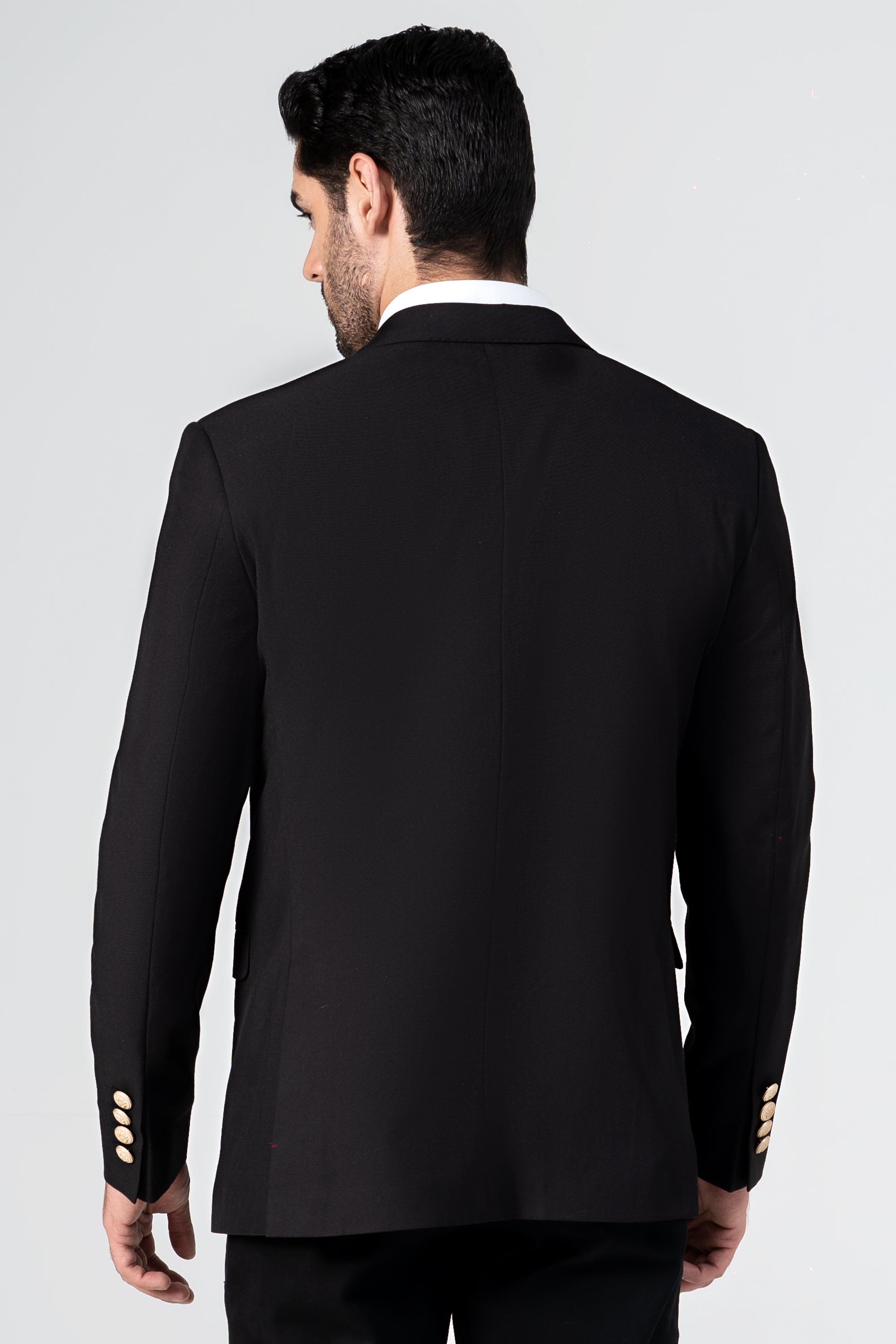 Black casual coat back view with long sleeves and buttoned cuffs