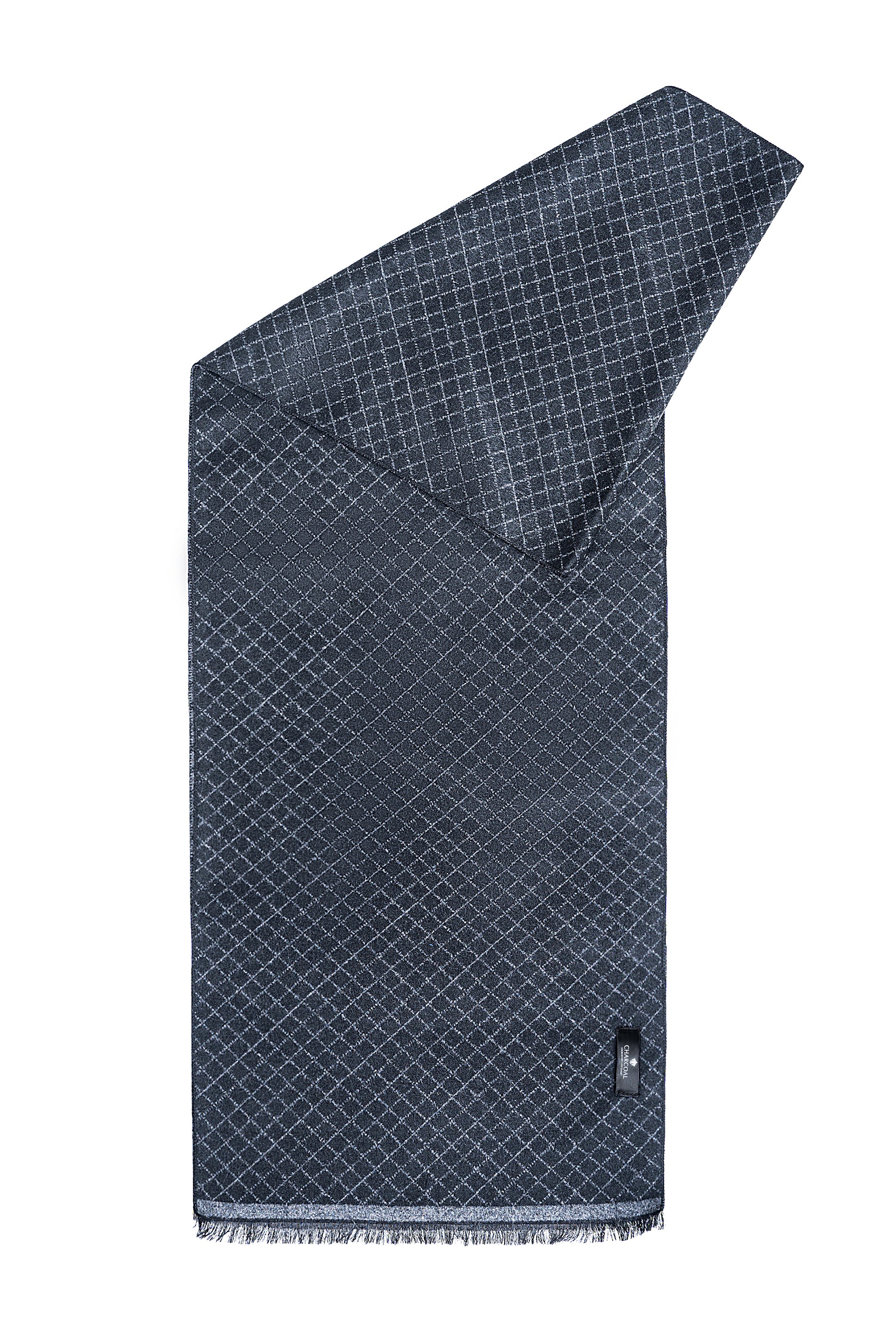 Navy patterned scarf folded, with fringed hem and end tag detail