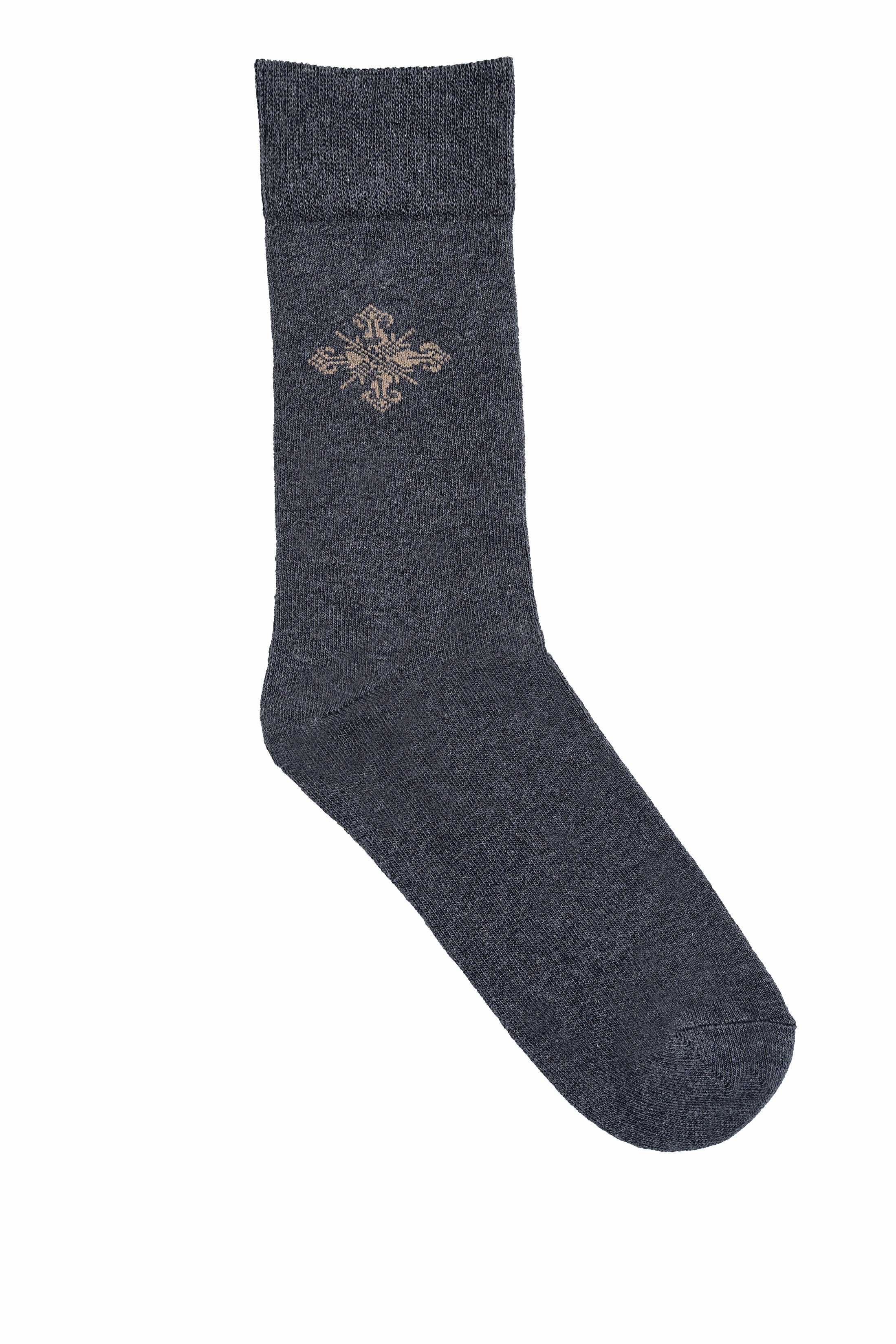 Wool socks in dark blue-gray with gold snowflake pattern, full length
