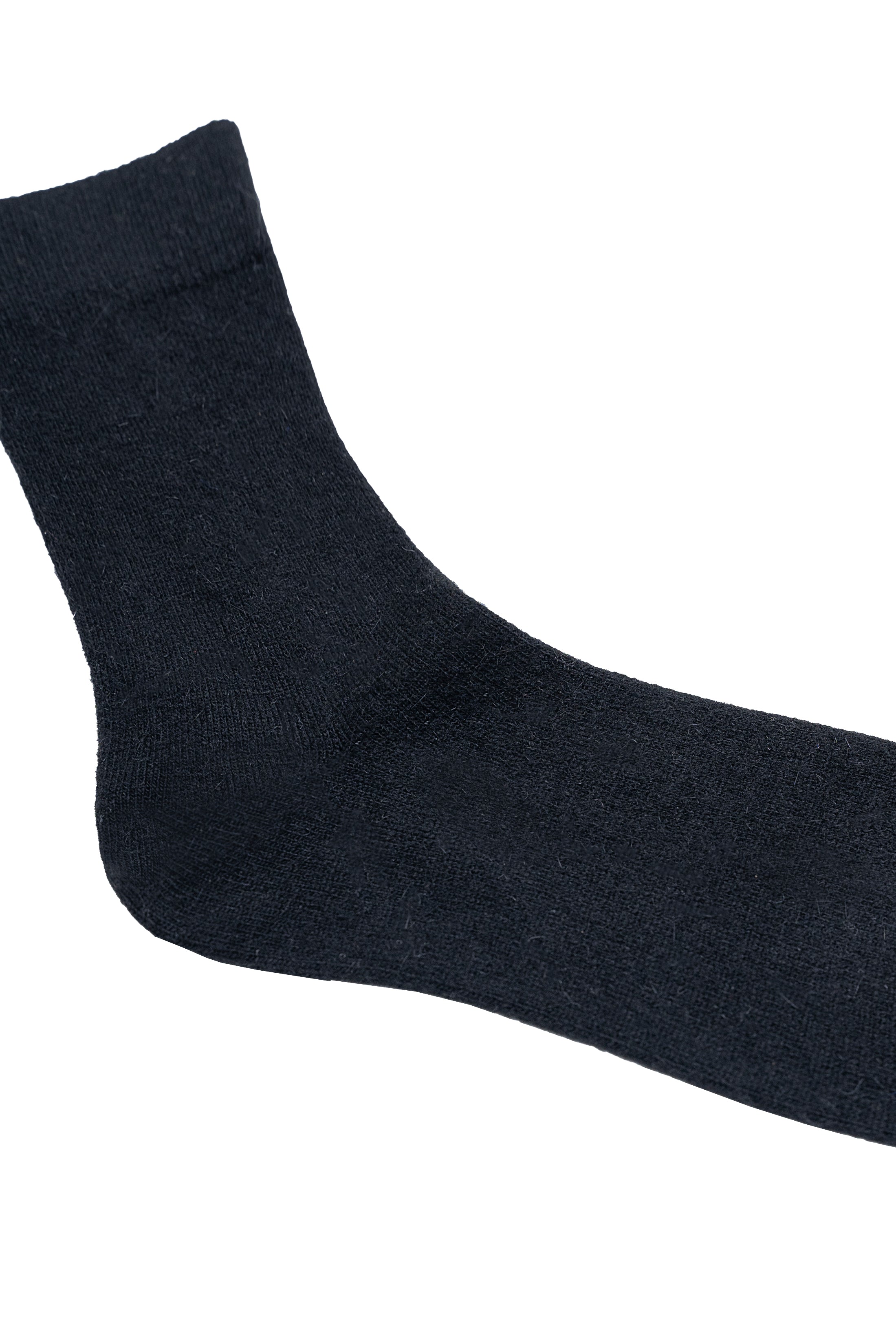 Dark navy wool sock close-up with ribbed cuff and knit texture