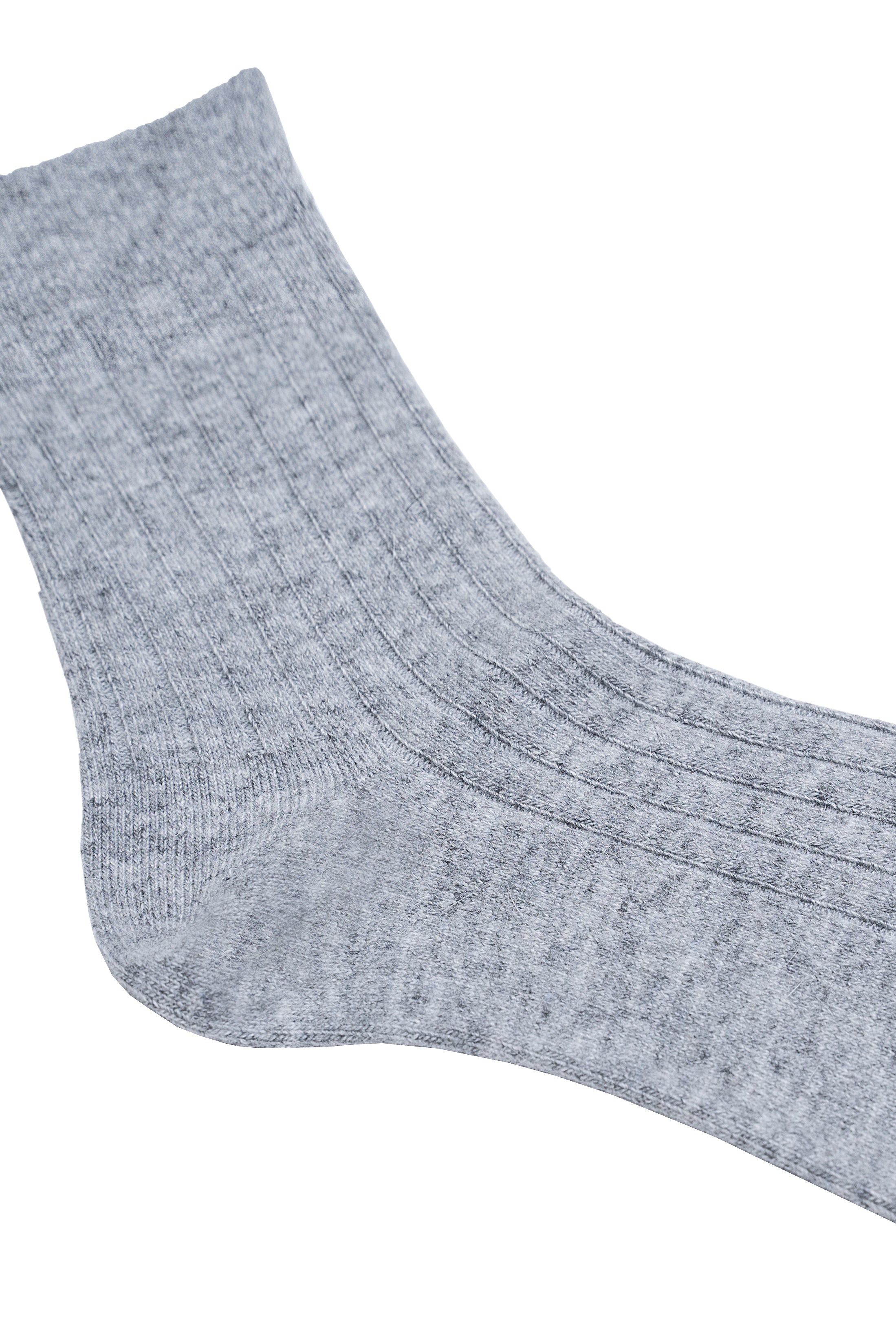 Gray wool crew sock close-up showing knit texture and seam at toe