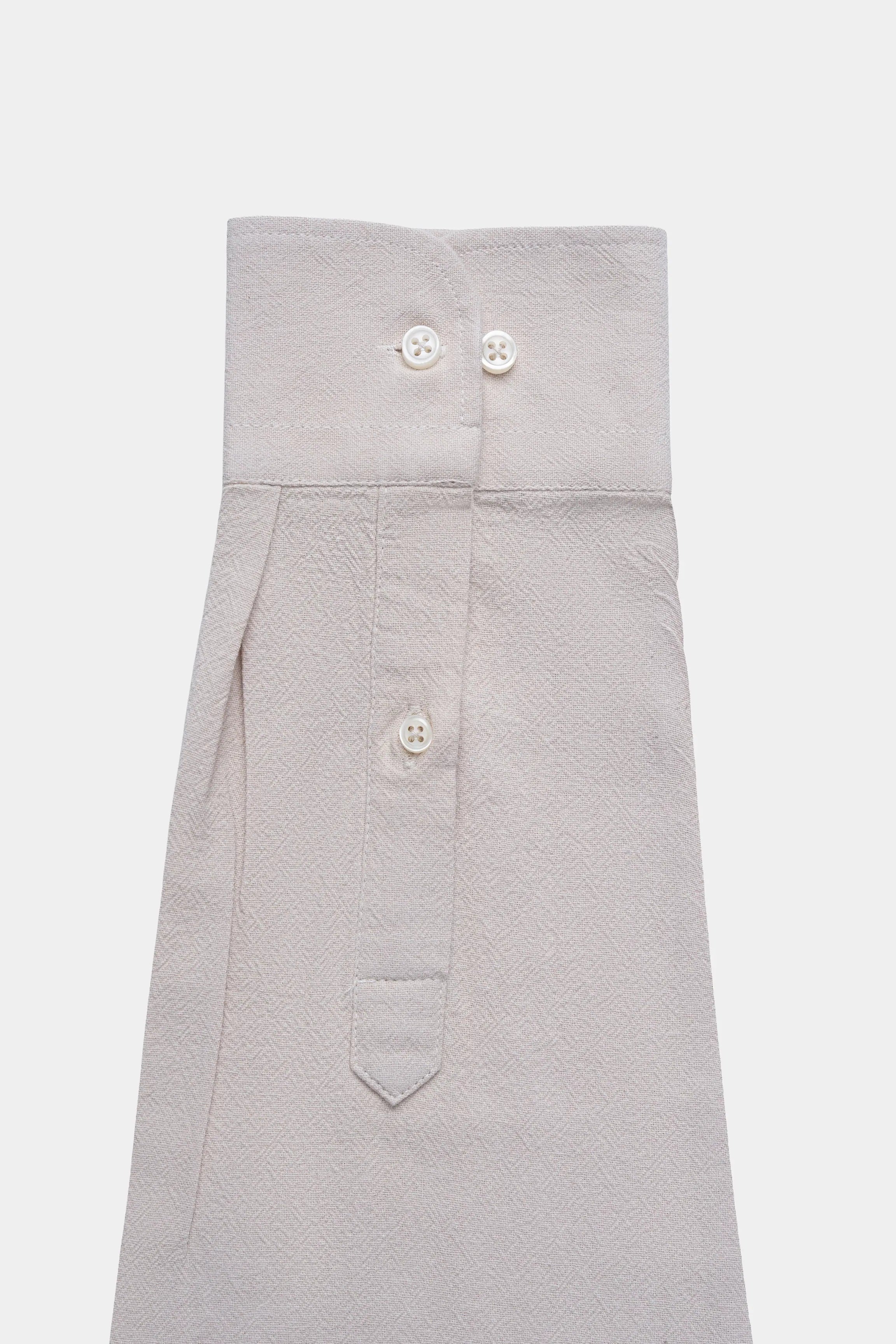 Beige shirt front with button placket and throat tab