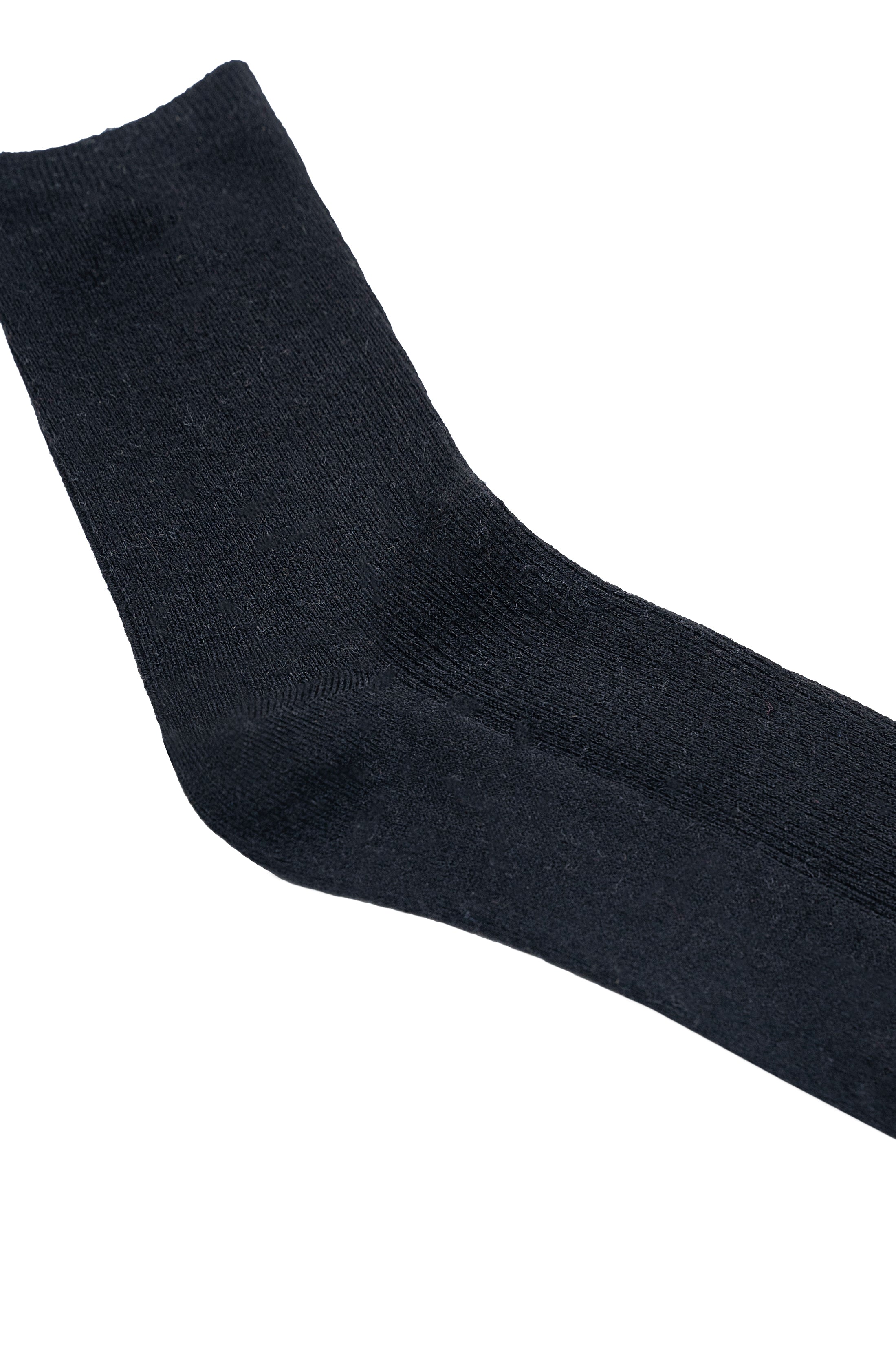 Dark wool crew sock, close-up of knit fabric and rounded toe