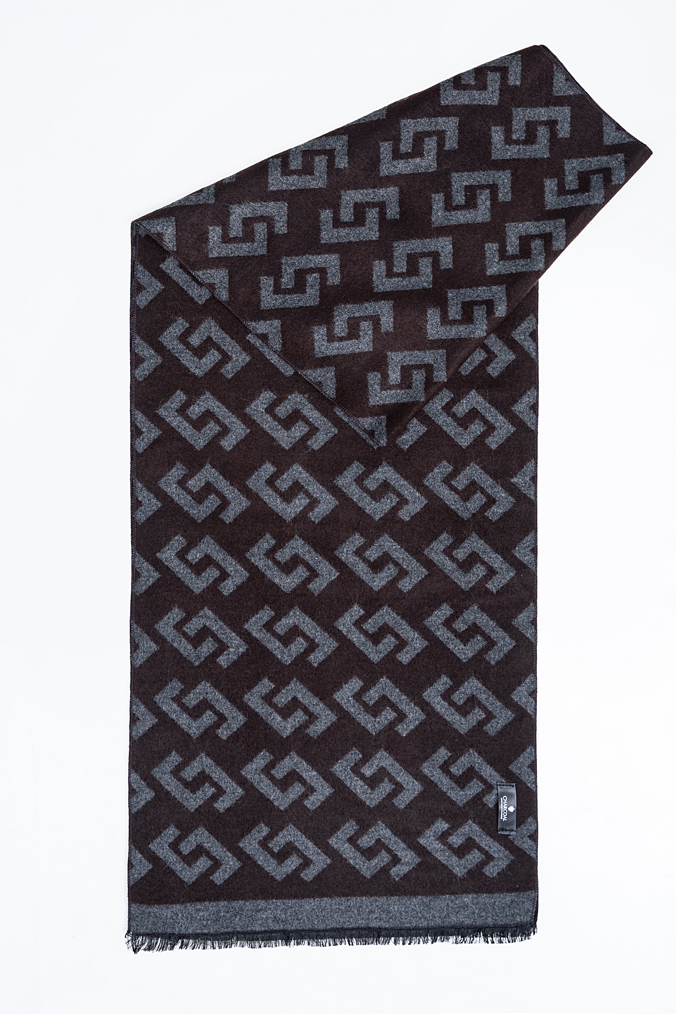 Dark charcoal Greek-key scarf with fringed hem, angled view