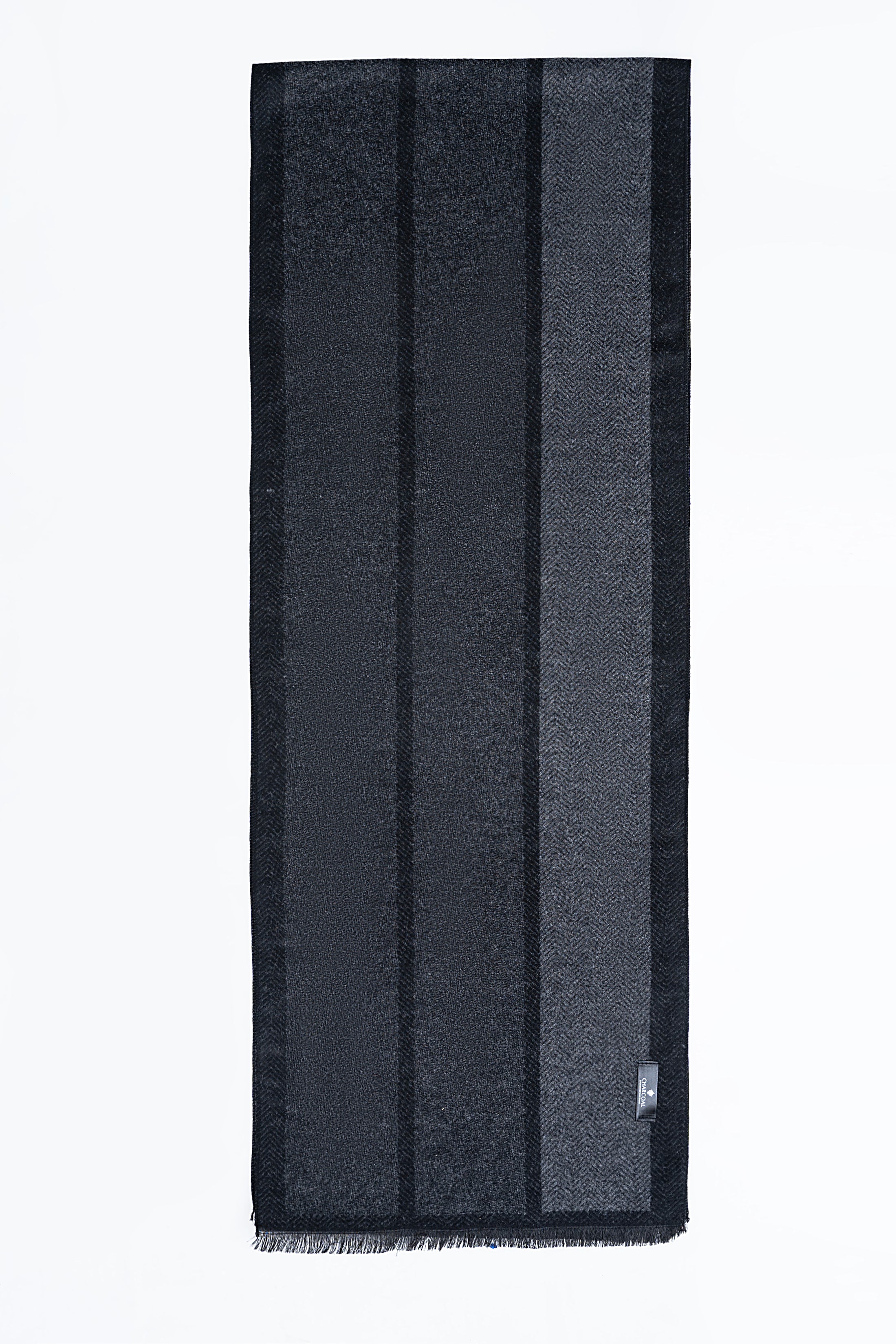 Dark striped scarf with fringed ends, rectangular fold, small logo tag