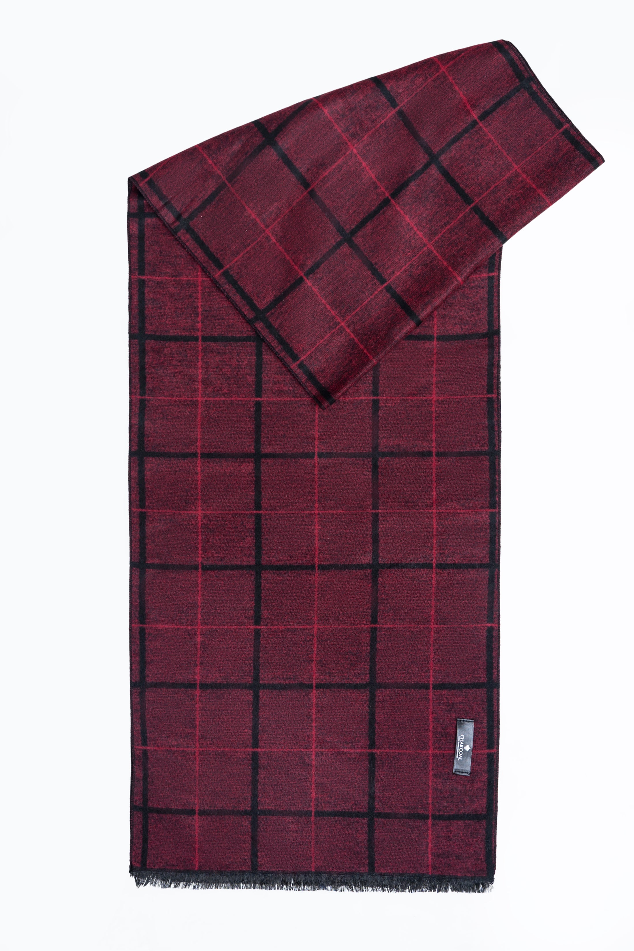 Burgundy scarf with black plaid grid, fringed hem, and folded corner view.