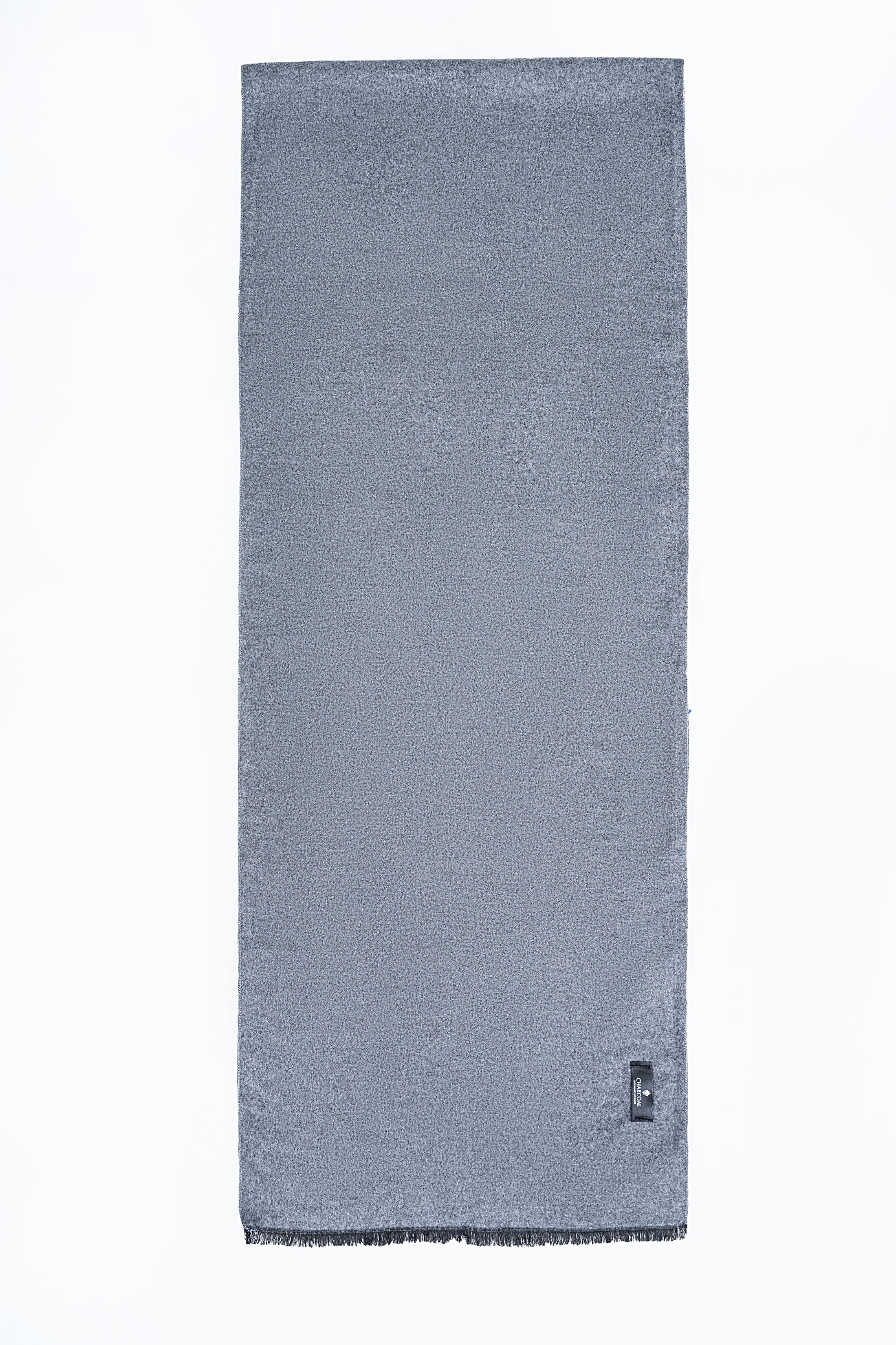 Blue-gray scarf, rectangular shape with small dark tag and sewn hem