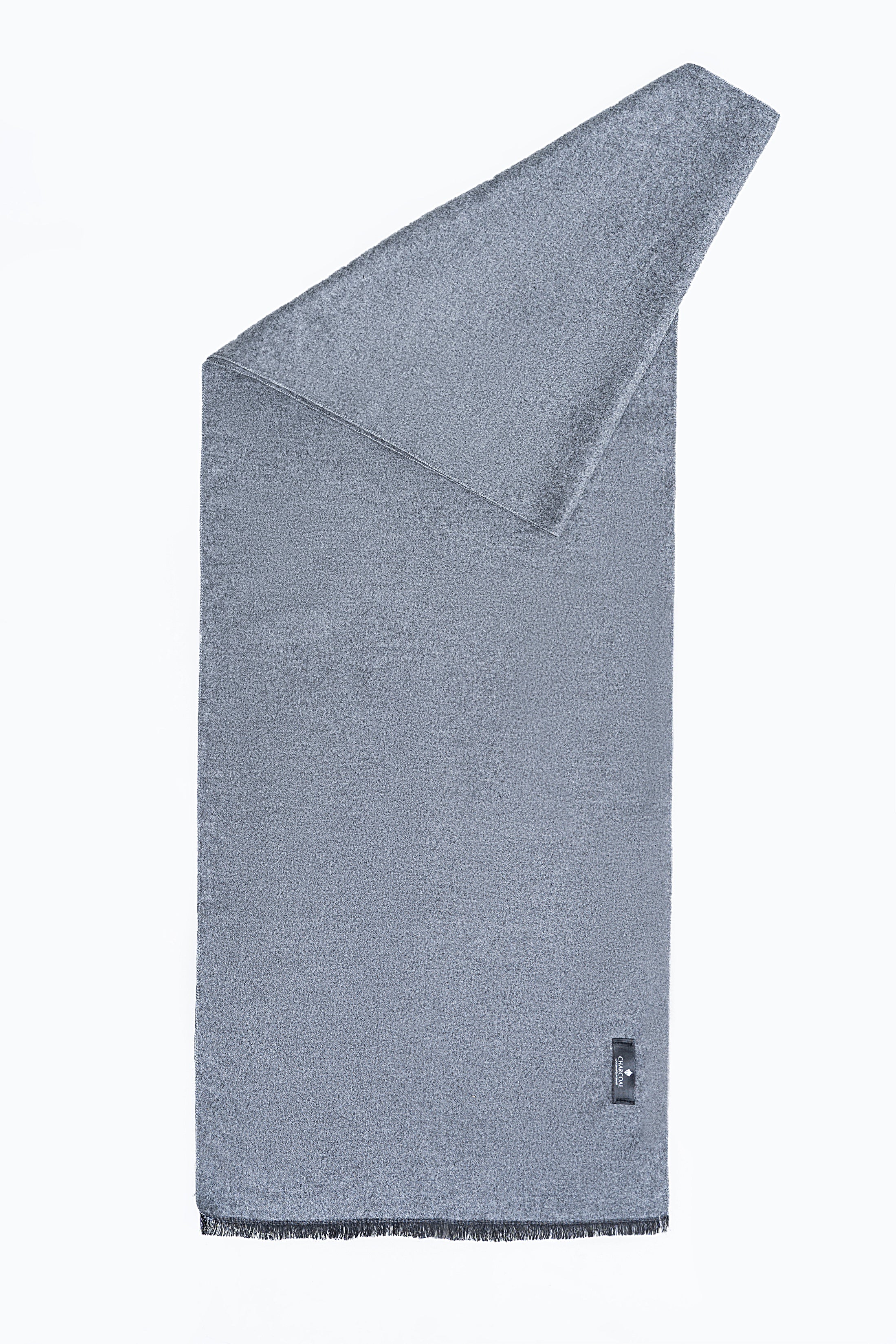 Blue-gray scarf with folded end and hemmed corner detail