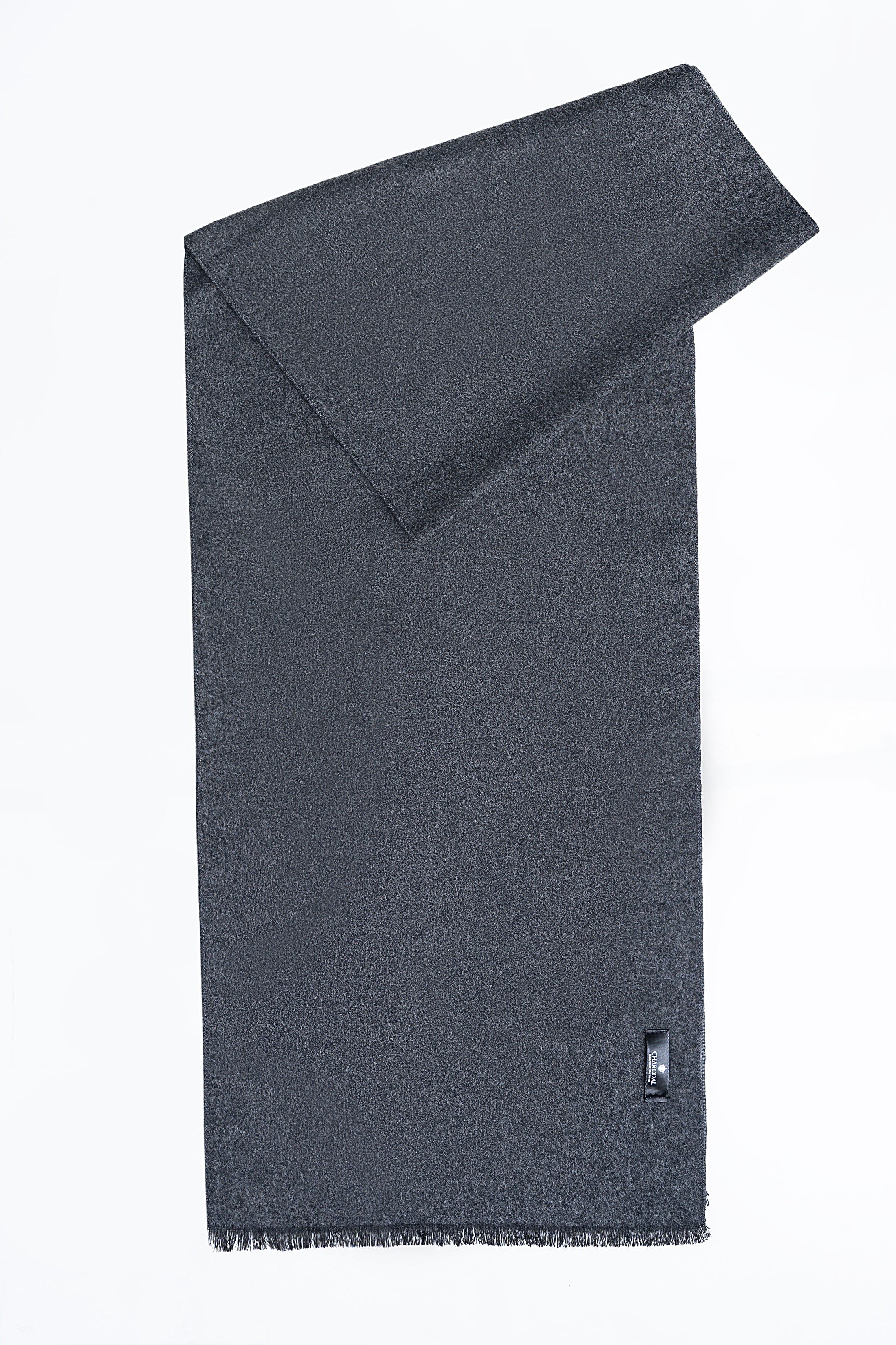 Dark gray textured scarf with folded corner and short fringed hem, small tag