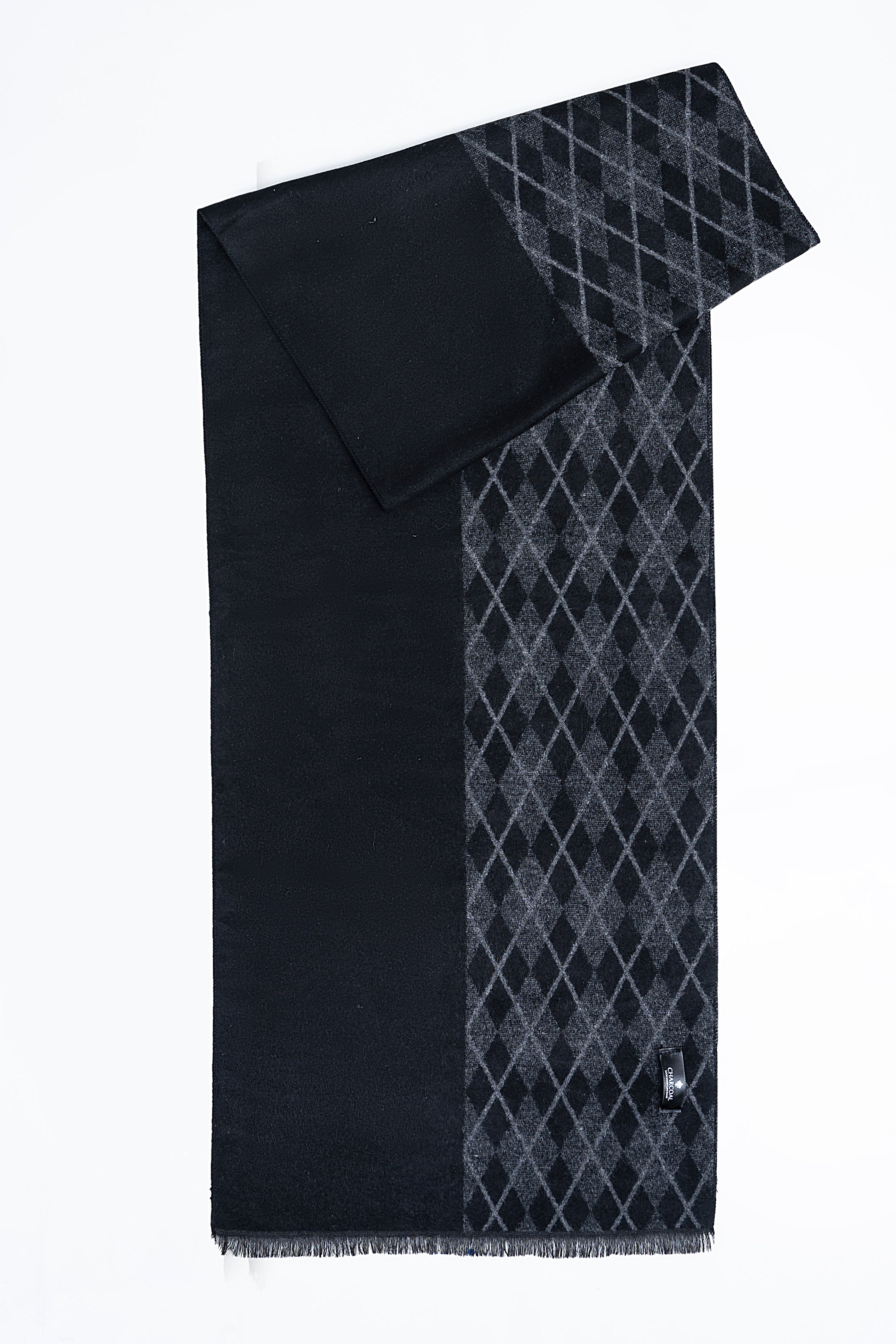 Dark scarf with large diagonal diamond panel, solid overlap, fringed hem