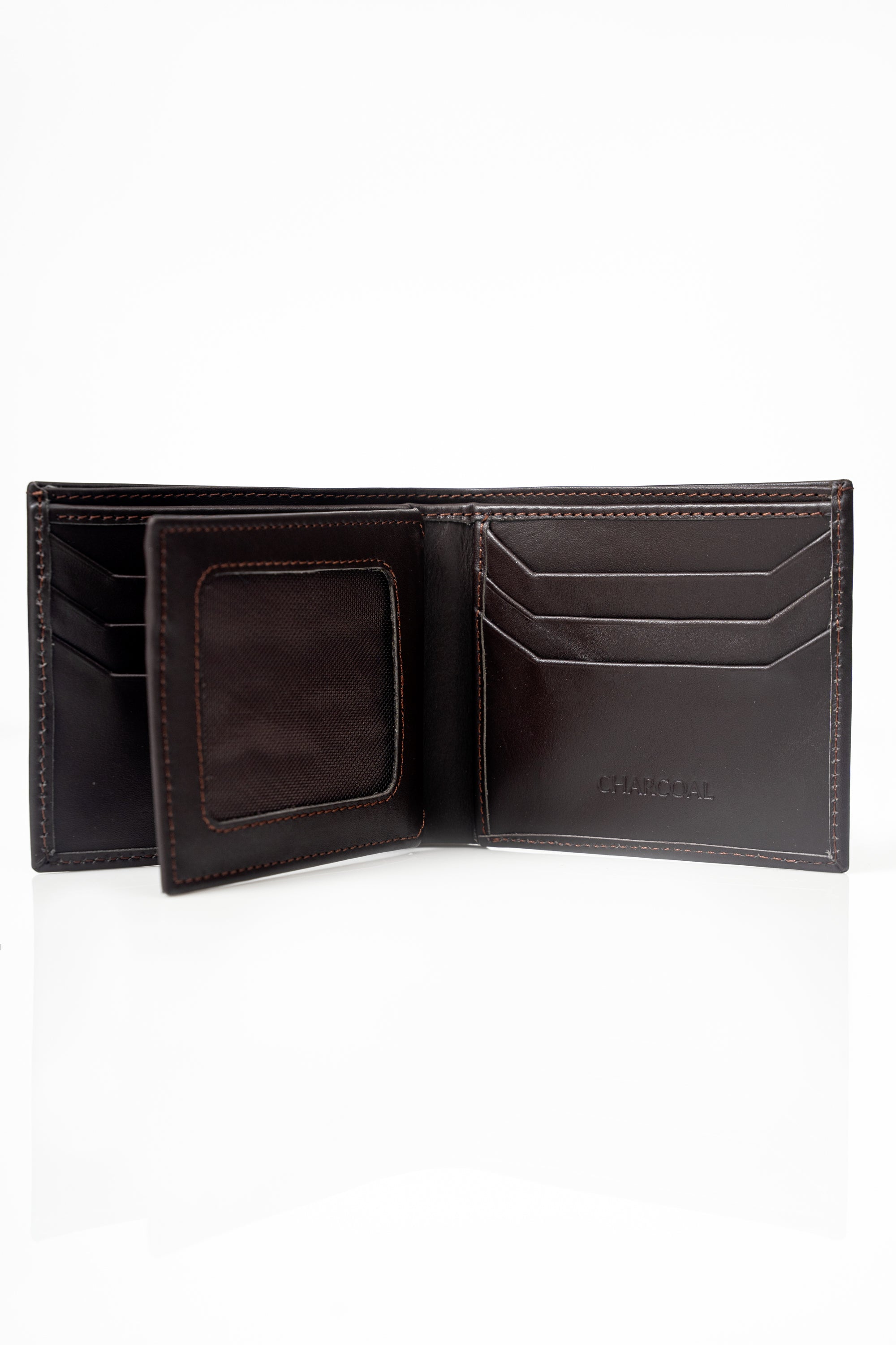 Open brown leather bifold wallet showing card slots and interior panels