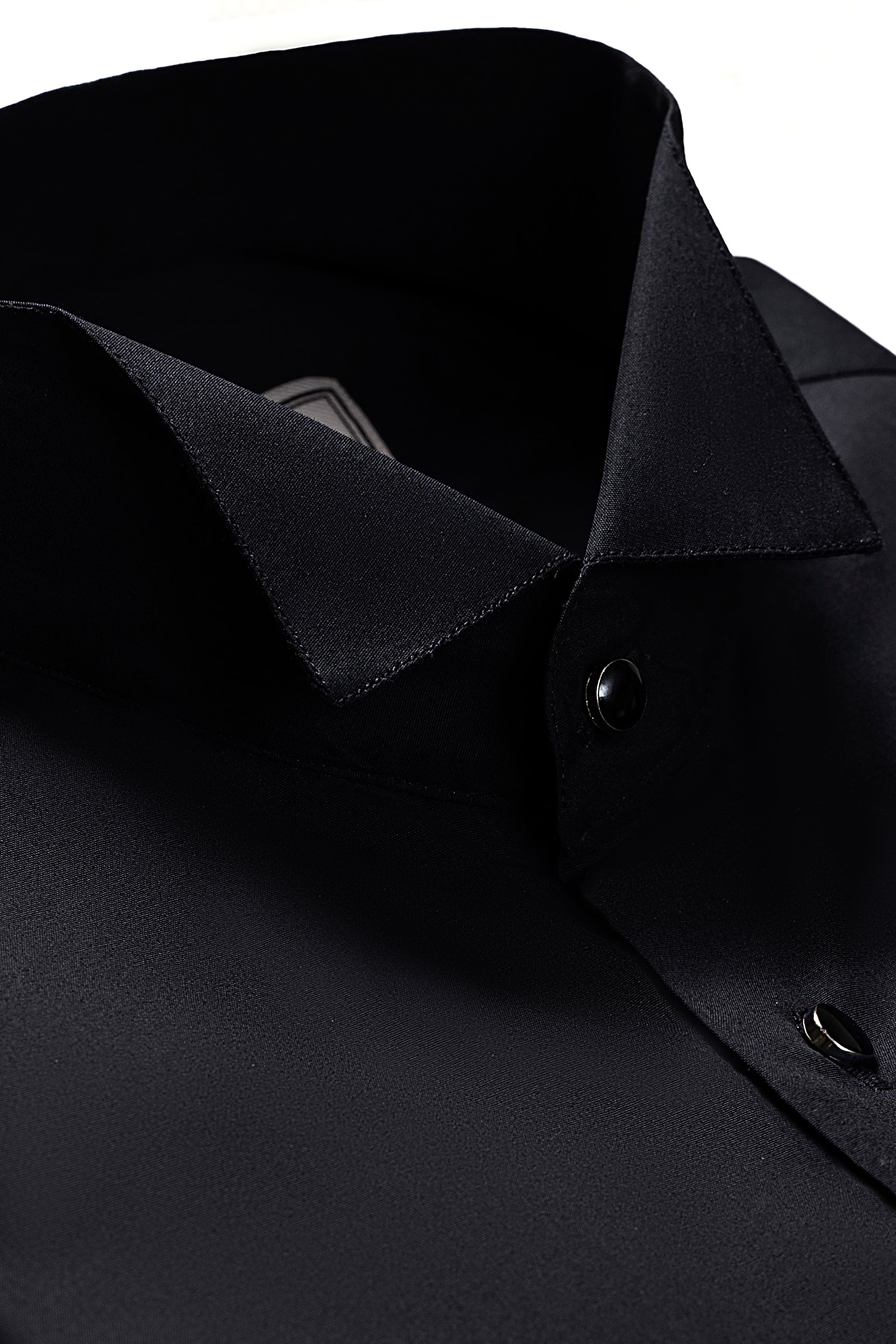 Black wing collar dress shirt close-up with round buttons